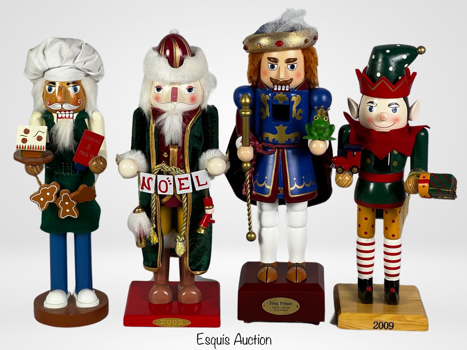 Lot of Wooden Christmas Nutcrackers- Lim Ed: Lot of Wooden Christmas Nutcrackers including Limited Edition Music Box. 15"tall. Good condition.