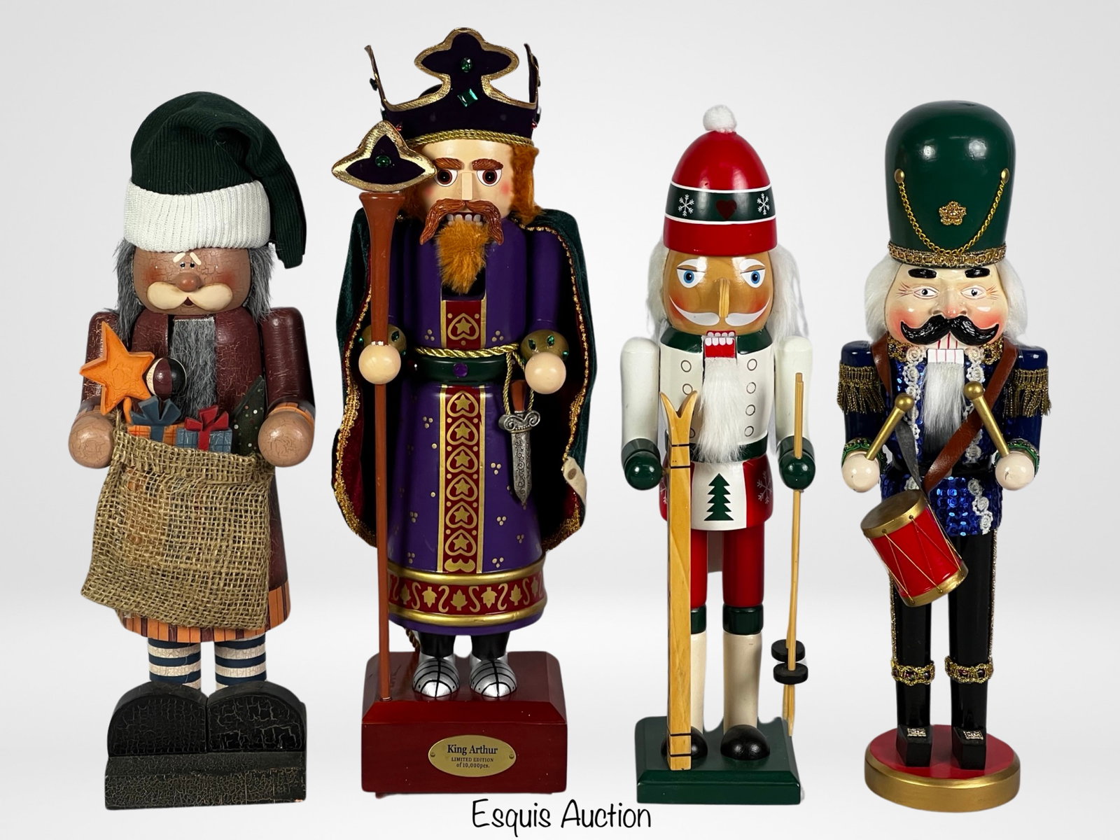 Lot of Wooden Christmas Nutcrackers- Lim Ed: Lot of Wooden Christmas Nutcrackers including Limited Edition Music Box. 15"tall. Good condition.