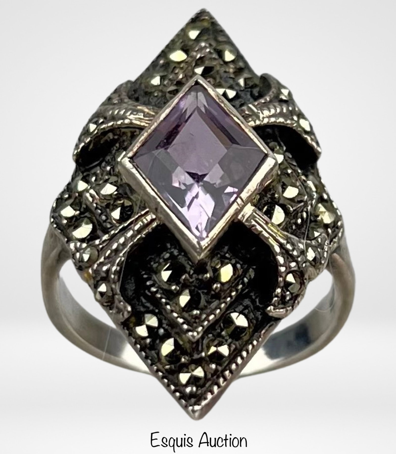 Sterling Silver Marcasite & Amethyst Lady's Ring: Sterling Silver Marcasite & Amethyst Lady's Ring. Size- 6. Good Condition.