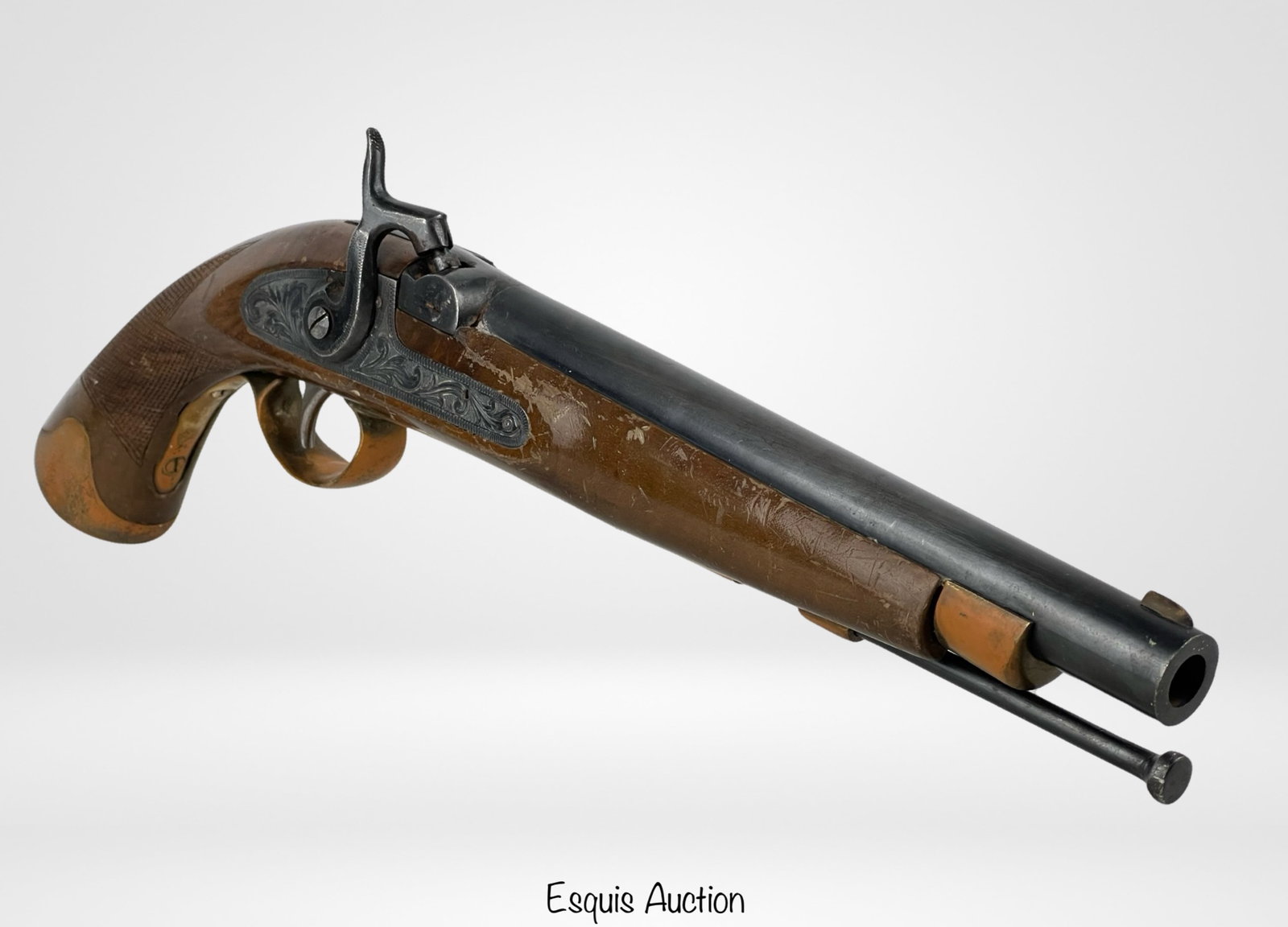 Vintage Spanish Flintlock Pistol Reproduction: This mid-20th-century flintlock pistol is a reproduction reminiscent of antique designs. Bearing the marking "Made in Spain" along the side of the barrel, this pistol reflects the craftsmanship and ar