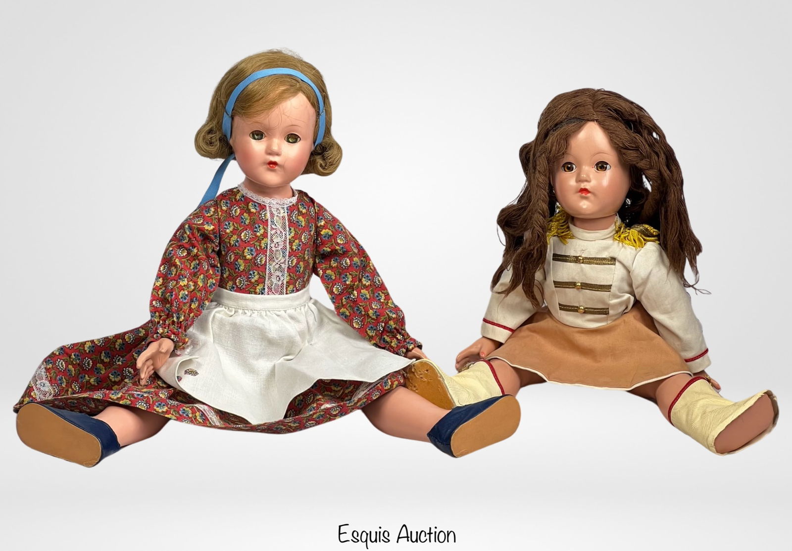 2 20" 1930's Effanbee Composition Dolls- Majorette: This charming pair of vintage Effanbee Composition Dolls from the 1930s showcases the quality craftsmanship and nostalgic appeal associated with Effanbee dolls.Majorette Composition Doll (18" Tall): D