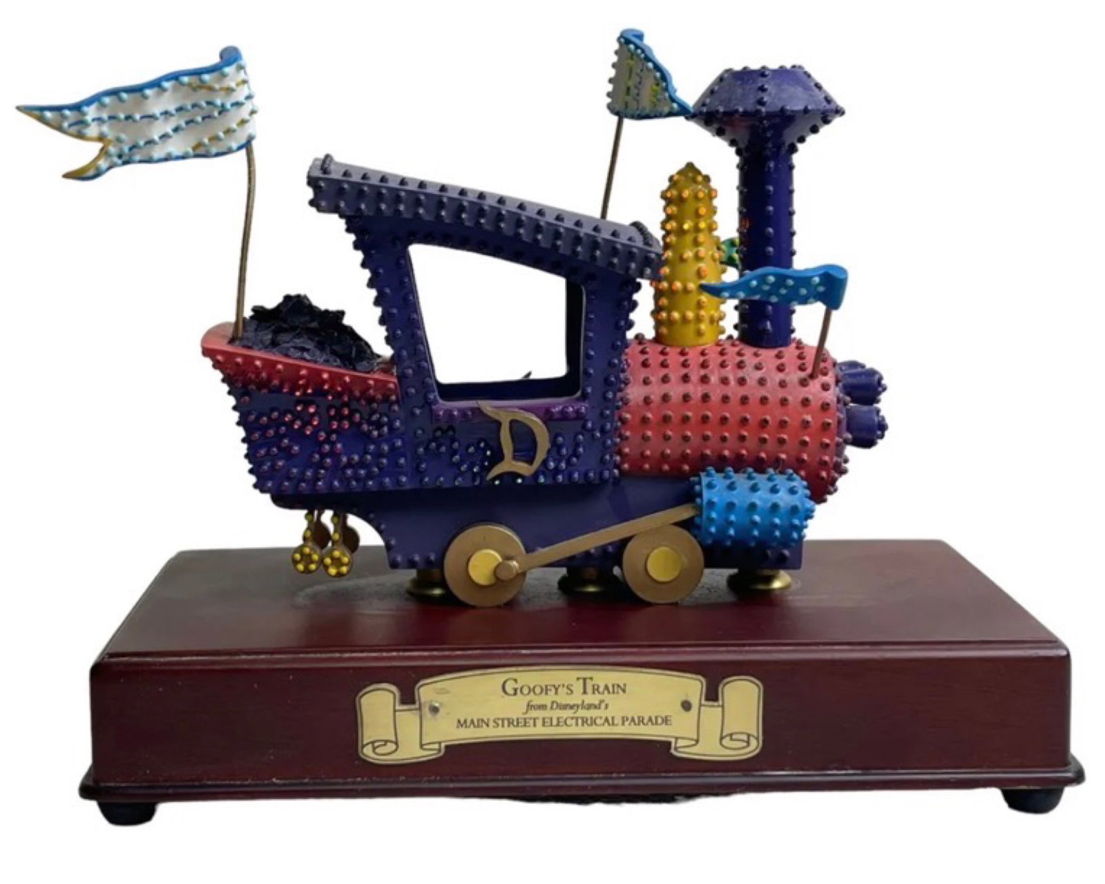 WDCC Disney Goofy's Train Sculpture Lights Up: Vintage WDCC Disney Main Street Electrical Parade Goofy's Train Lights Up.One small yellow piece is broken and missing,sell like as is!!!Tested and Working!!!Size 8x6x4 Inches.