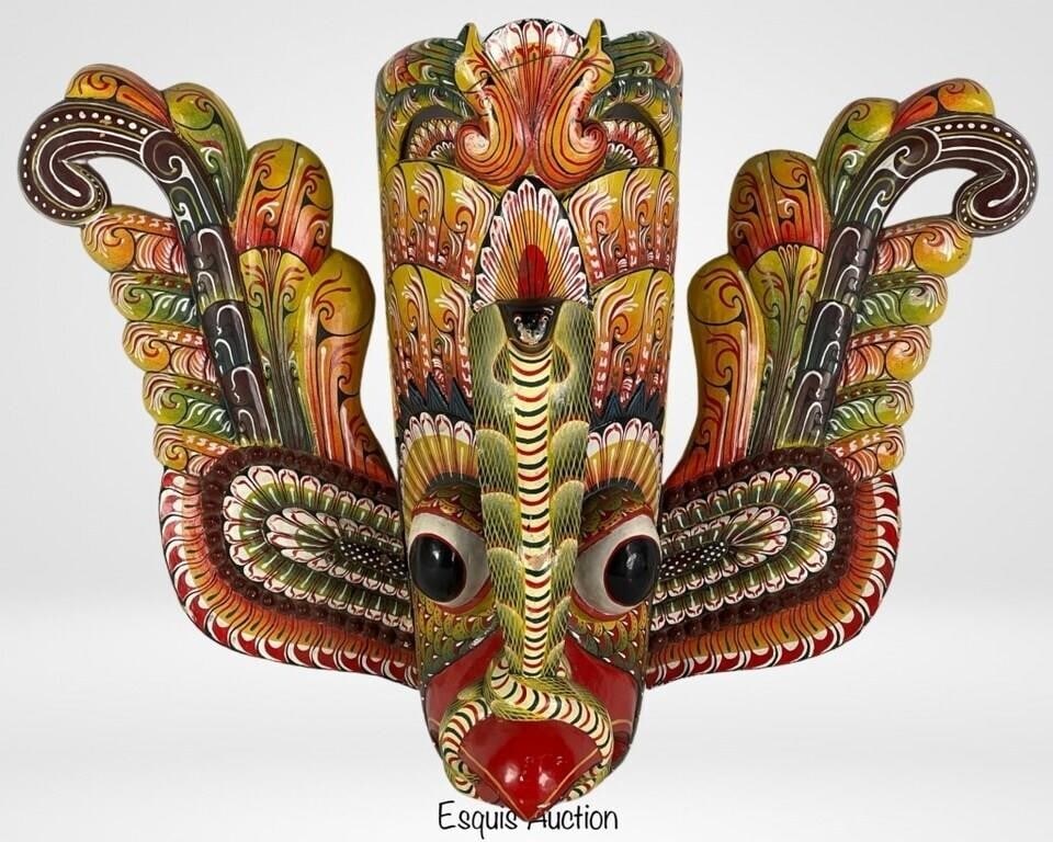 Sri Lanka Traditional Wood Carved Naga Raksha Mask: Behold the stunning craftsmanship of this vintage Naga Raksha mask from Sri Lanka. Hand-carved and meticulously hand-painted, this masterpiece exudes traditional charm and cultural significance. With 