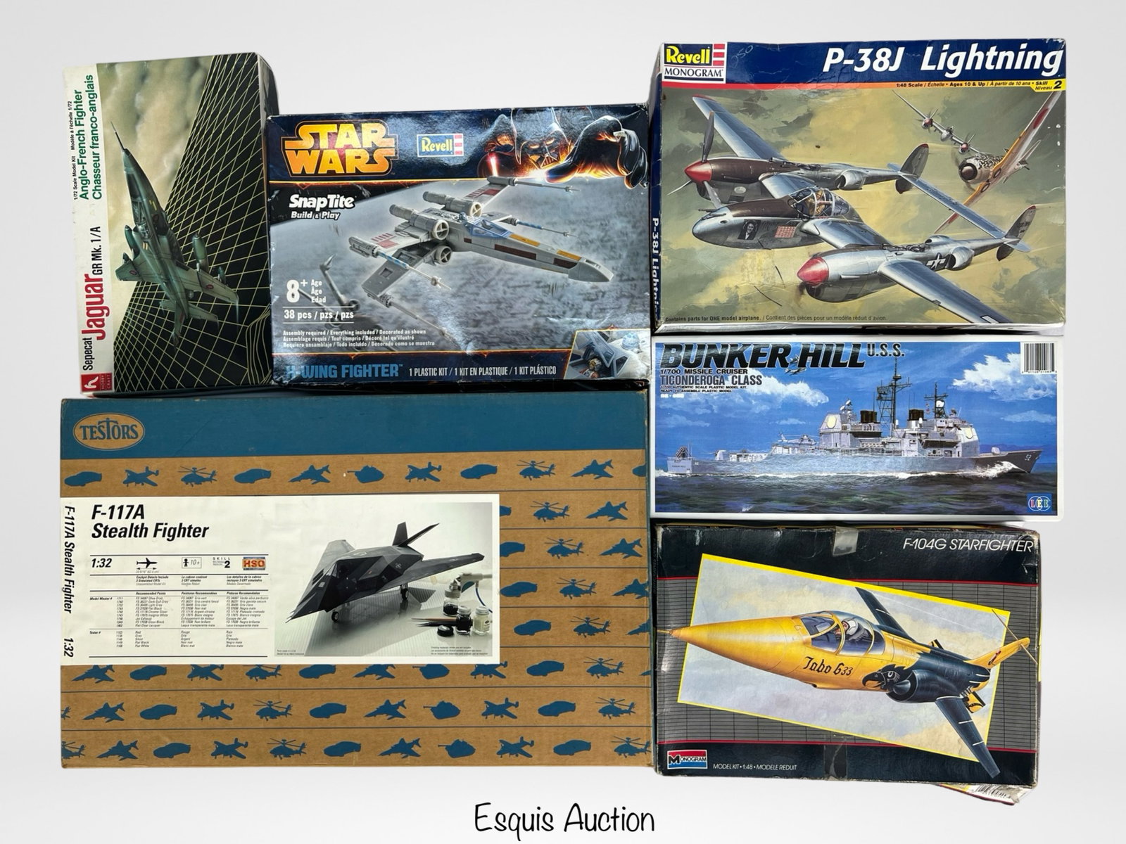 Vintage Military Aircraft & Ship Model Kits: Vintage Military Aircraft & Ship Model Kits. Appear to be in unassembled condition.