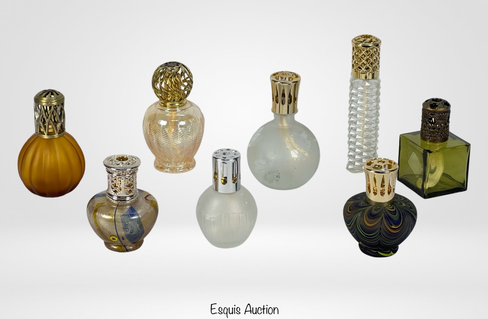 Art Glass Fragrance Aroma Lamps= Berger: Vibrant Collection of Art Glass Fragrance Aroma Lamps ? A harmonious ensemble of eight exquisite pieces in various colors, featuring renowned Berger French Lamps. Ranging in height from 5 1/2" to 8 1/
