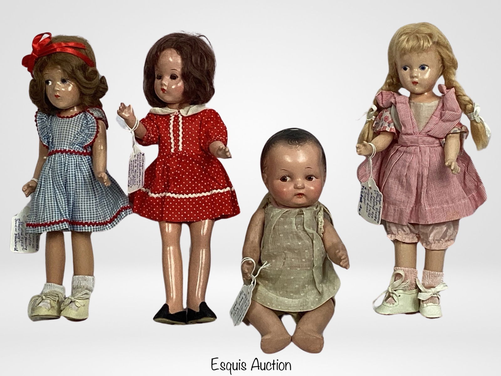 Lot of Vintage Composition Dolls from 1940's: Dive into the enchanting world of vintage composition dolls with this delightful lot featuring a diverse collection of charming characters.Vintage Composition Effanbee Suzette Doll with original Dress