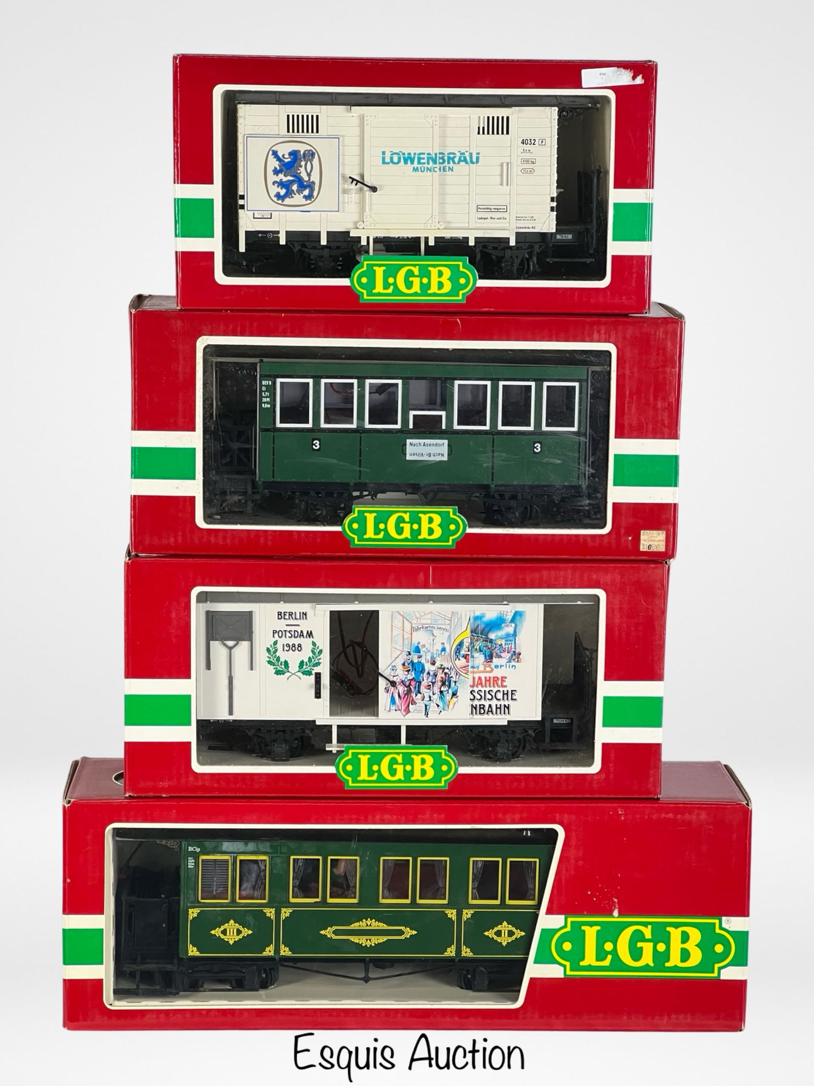 LGB Lehmann G Gauge RR Train Cars: LGB Lehmann G Gauge RR Train Cars including 1988 Berlin-Potsdam Freight Car 3020, Lowenbau Freight Car 3019, Passenger Car 4028B and Passenger Car 3060. All in original boxes.