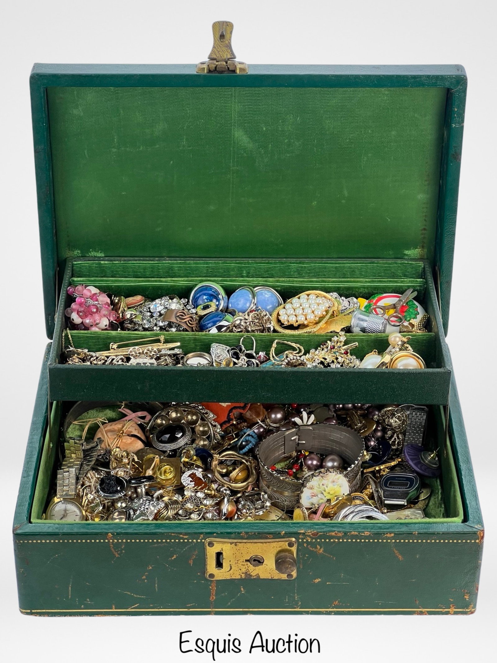 Vintage Jewelry Box filled with Jewelry & Watches: Embark on a delightful journey of discovery with a vintage jewelry box filled with unsearched treasures. Each piece within holds the mystery and charm of eras past, waiting to be revealed.
