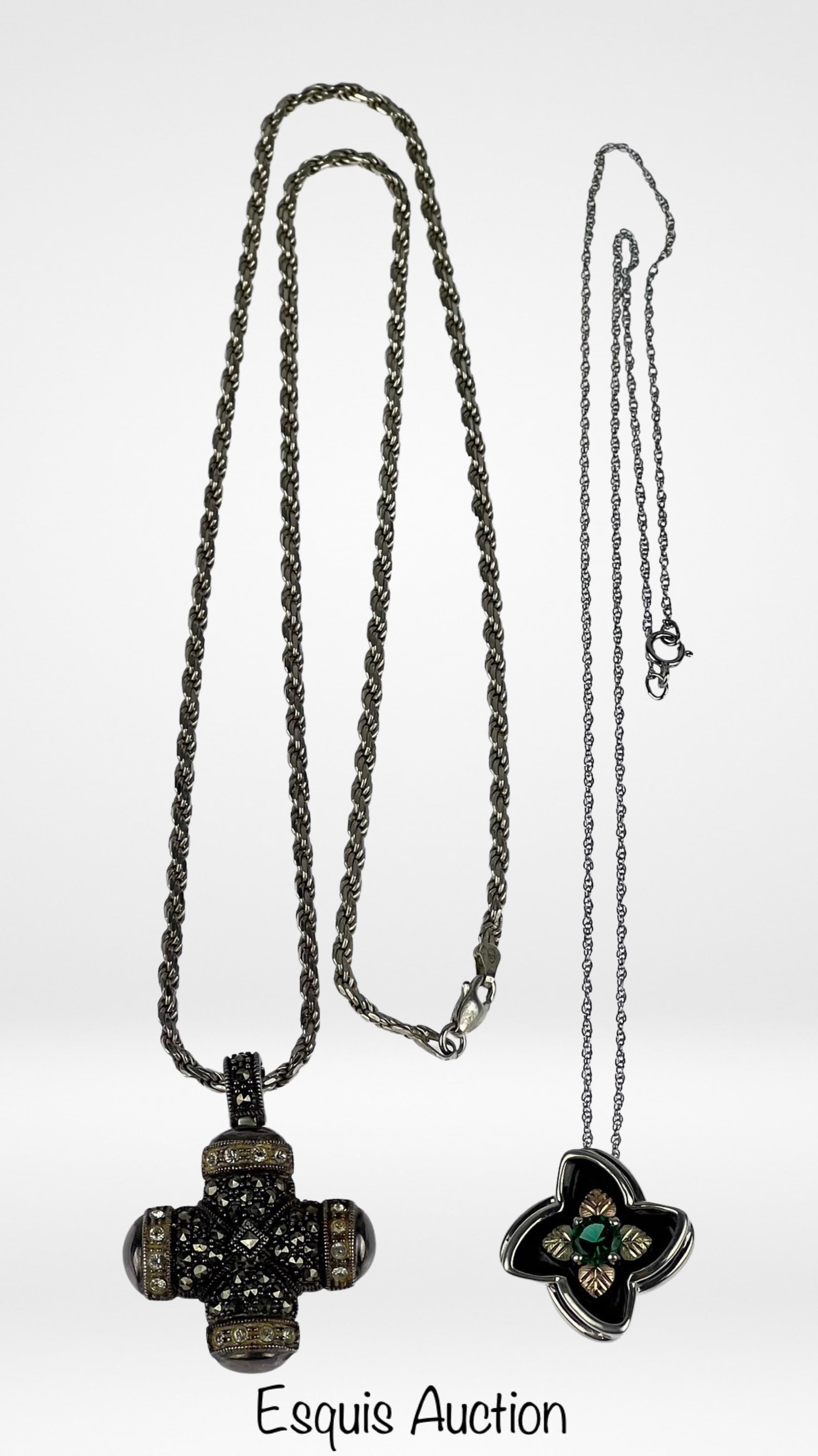 Sterling Silver Necklaces with 12k Rose Gold Penda: Sterling Silver Necklace with Sterling & 12k Rose Gold Flower Pendant. Comes with Sterling Silver Necklace with Sterling, Marcasite & Crystals Cross Pendant. Necklaces are 18"-22" long. Good Condition