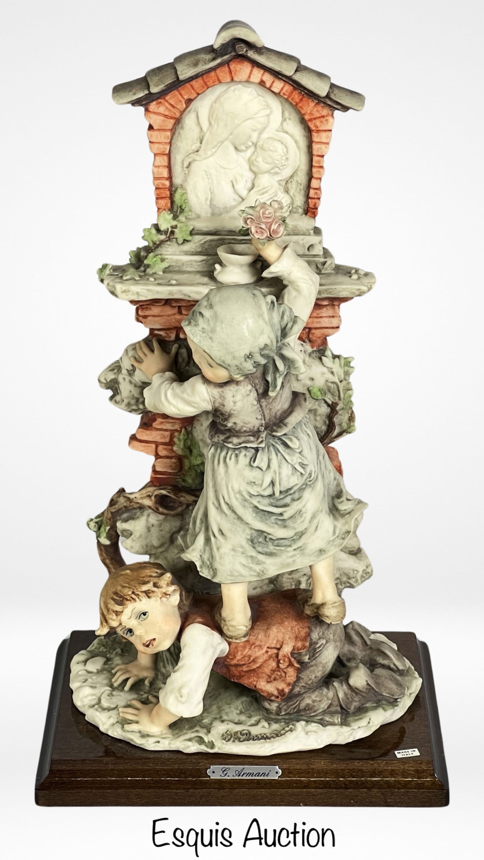 Giuseppe Armani- Flowers for Blessed Mother: Embrace the beauty of Giuseppe Armani's artistry with the captivating figurine titled "Flowers for Blessed Mother's Shrine." Identified as 301C, this 13-inch tall creation is a testament to Armani's s