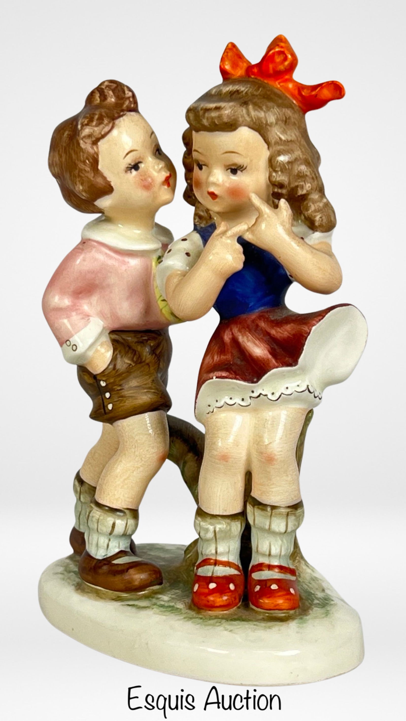 Goebel 'Nasha' Porcelain Figurine- Full Bee 1950's: Delight in the vintage charm of the Goebel 'Nasha' Porcelain Figurine, portraying a boy and girl in a heartwarming embrace. Featuring the iconic Full Bee mark and dating back to the 1950s with the TMK