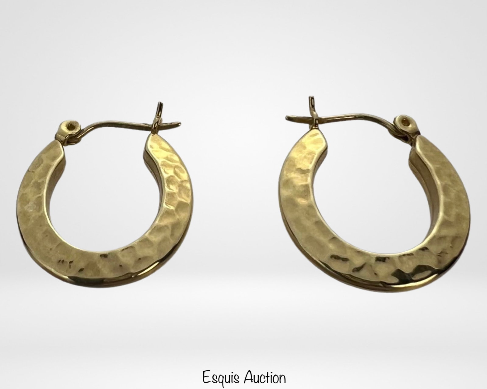 10k Gold Huggie Earrings: 10k Gold Huggie Earrings. 3/4" x 1/2". Good Condition.