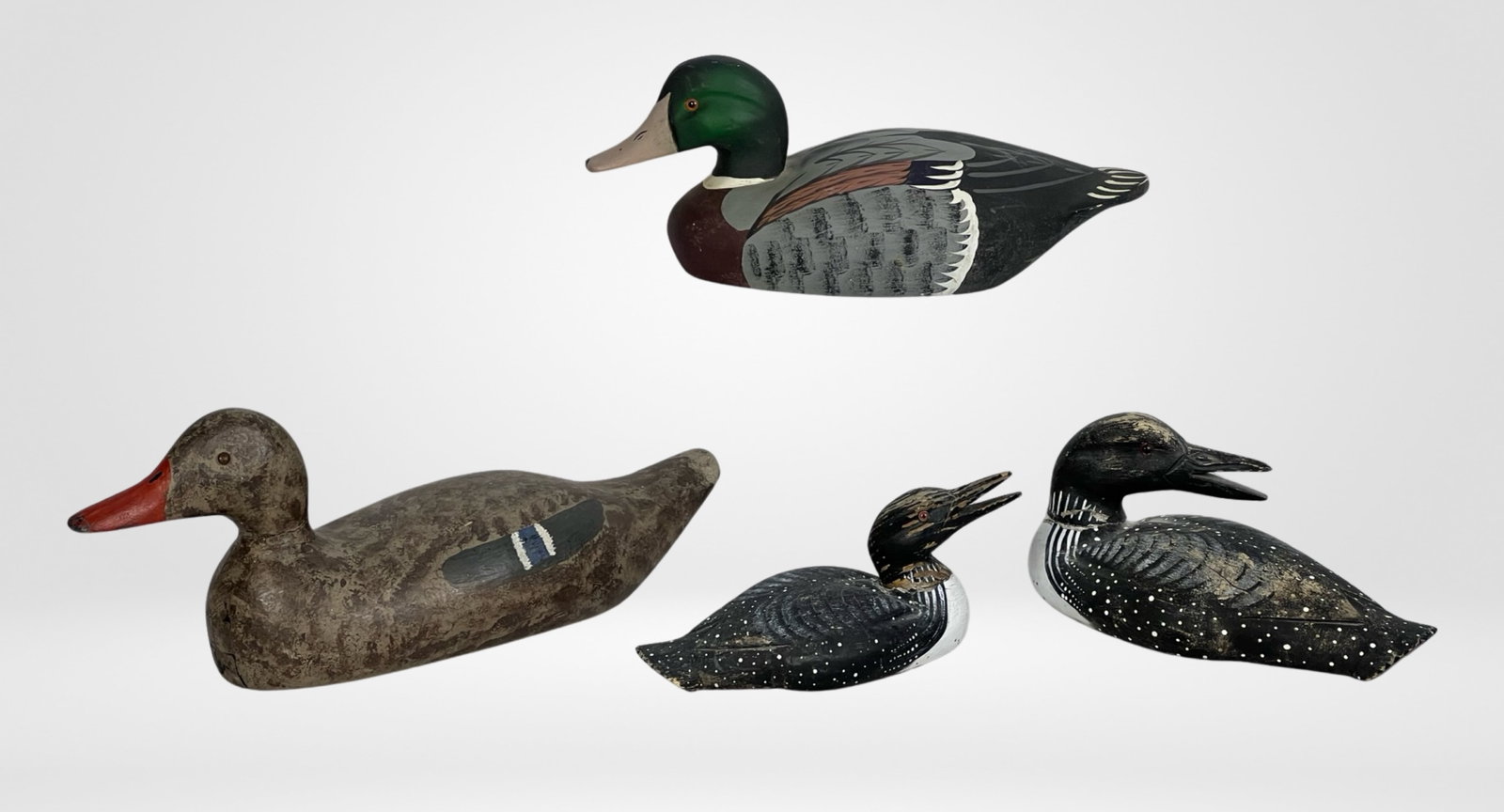 Vintage Wooden Duck & Loon Decoys: Vintage Wooden Duck & Loon Decoys. Largest is 17" long.
