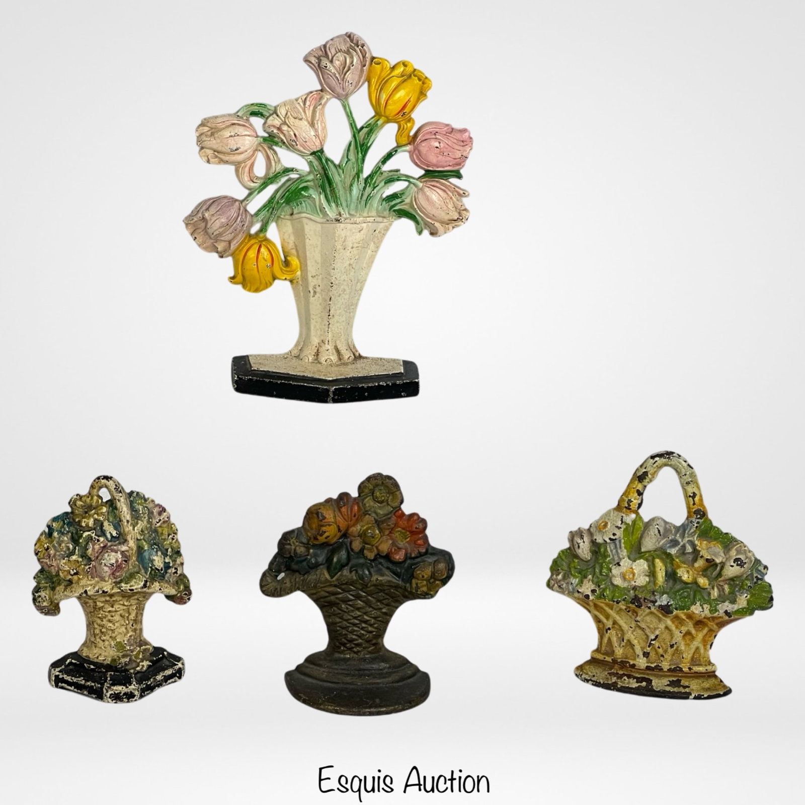 Lot of Antique Cast Iron Flower Basket Door Stops: Lot of Antique Cast Iron Flower Basket Door Stops. Largest is 10" x 8".