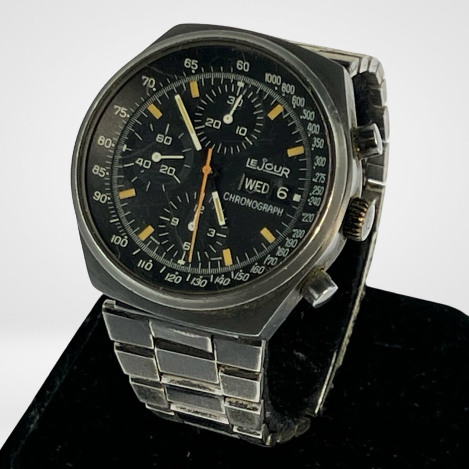 Heuer's Le Jour "Top Gun" Chronograph Watch: Heuer's Le Jour Chronograph Watch. Used, Shows some wear and requires cleaning and service. Starts torun but stops. Another instantly recognizable example of this early PVD day-date chronograph can be