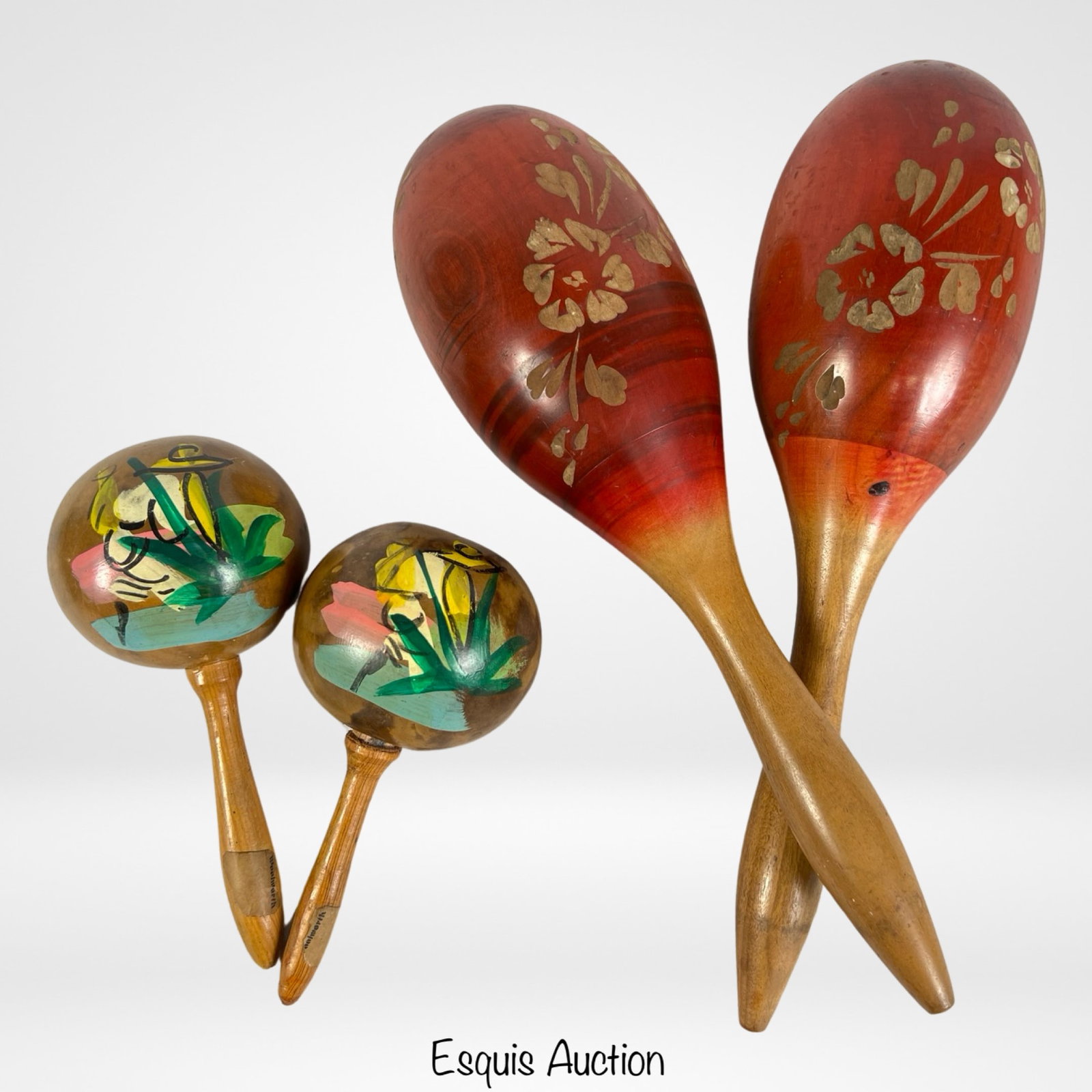 Two Pairs of Vintage Mexican Wooden Maracas: Bring the vibrant rhythms of Mexico into your music with this set of Two Pairs of Vintage Mexican Wooden Maracas. Crafted with care and authenticity, these maracas not only produce lively beats but al