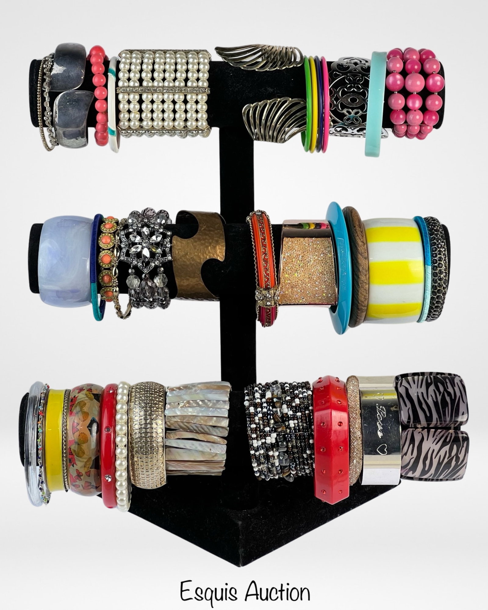 Assortment of Lady's Bracelets: Elevate your wristwear with this exquisite Assortment of Lady's Bracelets. Whether you seek delicate charm or statement pieces, this collection offers a diverse symphony of styles to complement any ou