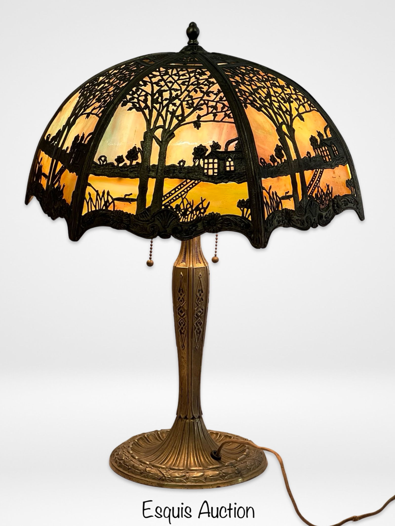 1920's Everlay Slag Stained Glass Table Lamp: Illuminate your space with timeless elegance and vintage charm with this exquisite antique 1920's overlay slag stained glass shade table lamp. Standing at 22 inches tall, this lamp boasts a two-socket