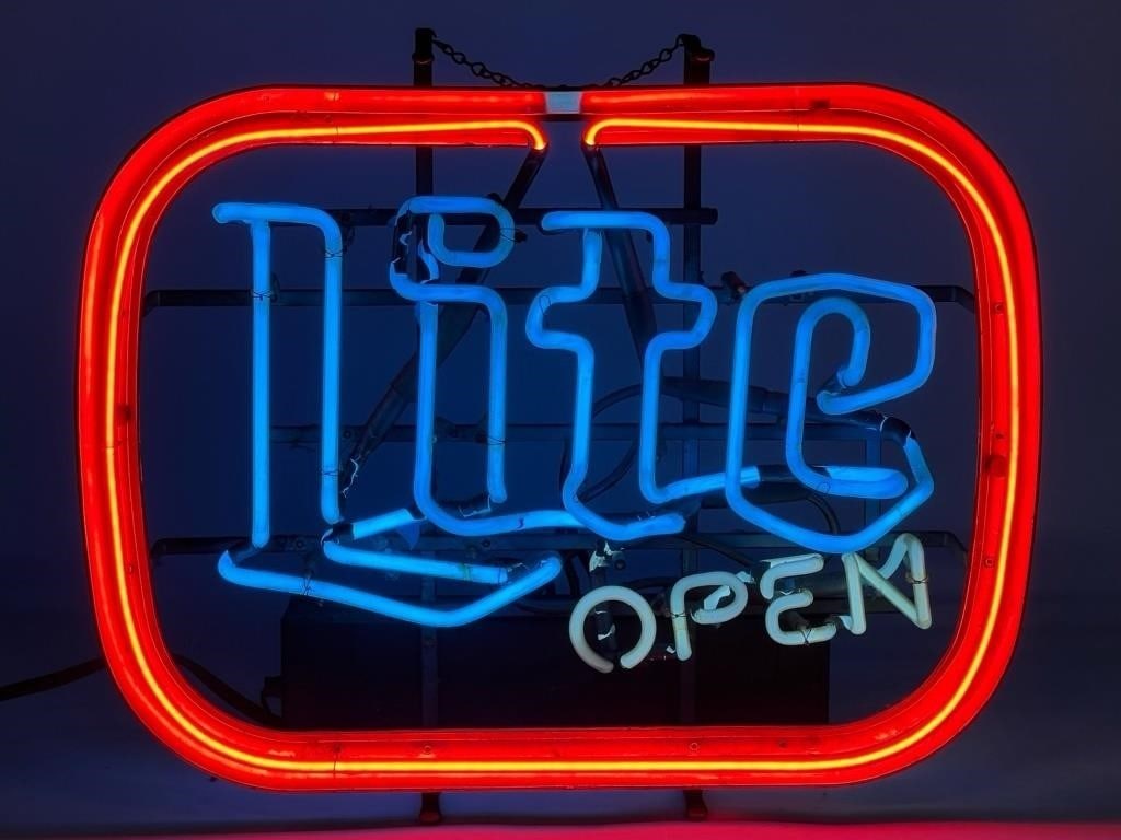 1980's Miller Lite "Open" Neon Beer Light Up Sign: The Vintage 1980's Miller Lite "Open" Neon Beer Advertisement Light Up Sign stands as an iconic representation of 1980s pop culture and advertising aesthetics. Measuring approximately 22 inches in wid