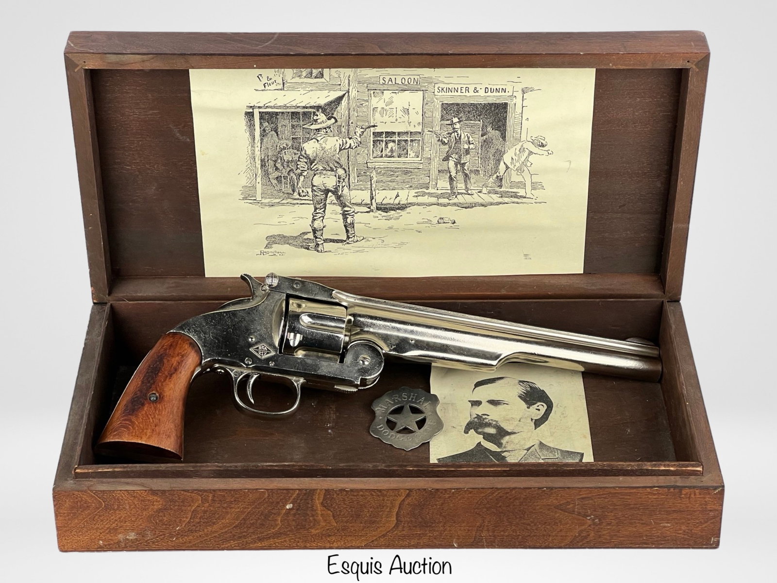 BKA 217 Replica Smith & Wesson Schofield Revolver: BKA 217 replica Smith & Wesson Schofield revolver, complete with a Marshall Dodge City replica badge in a wooden box. This replica revolver pays homage to the iconic firearm used during the American O
