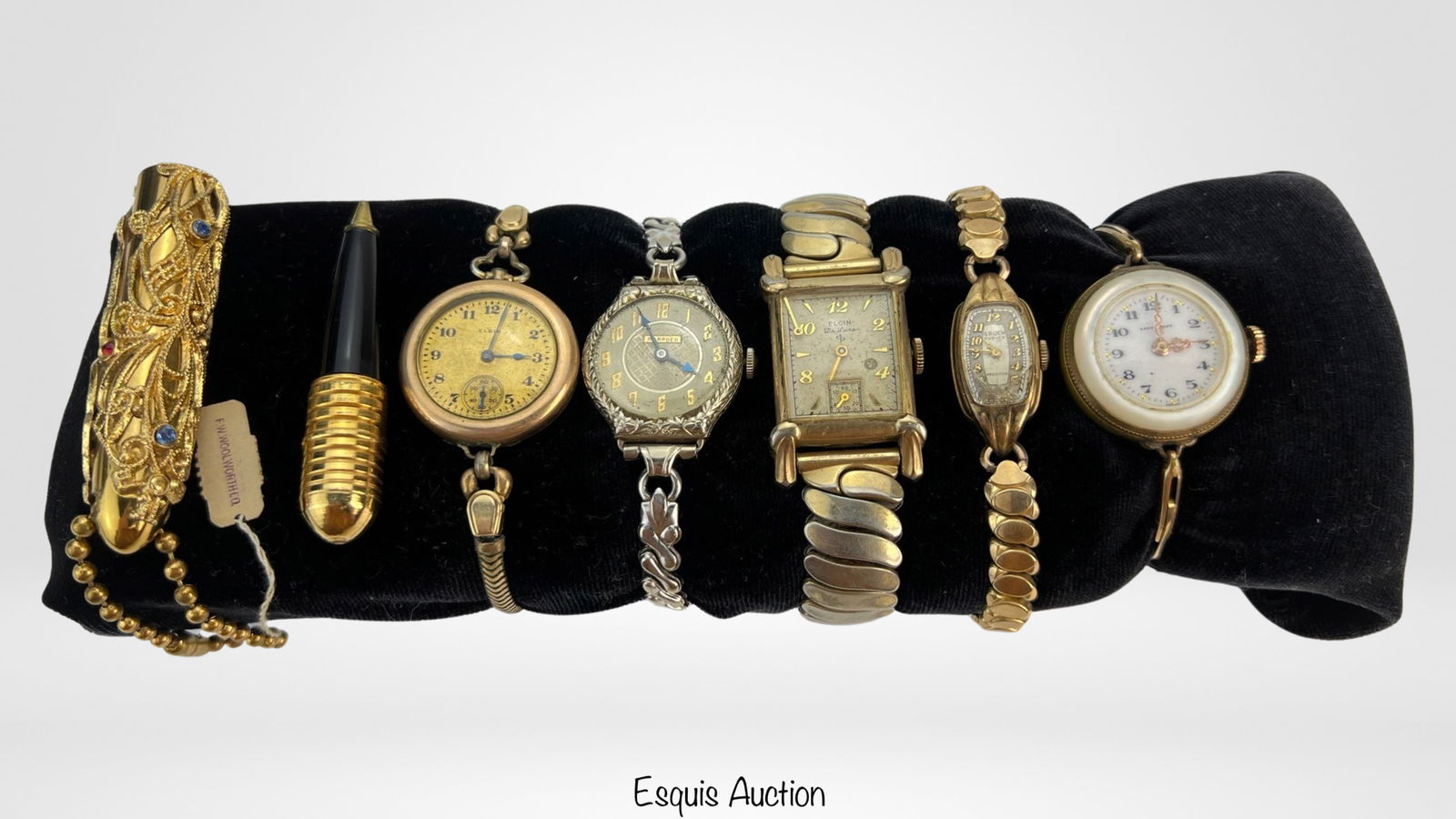 Assortment of Vintage Lady's Wrist Watches: Assortment of Vintage Lady's Wrist Watches- Lady Grand, Elgin, Hampden, Gruen. Come with Vintage Ornate with Rhinestones Lady's Pocket Pen. Untetsed, some might be as found.