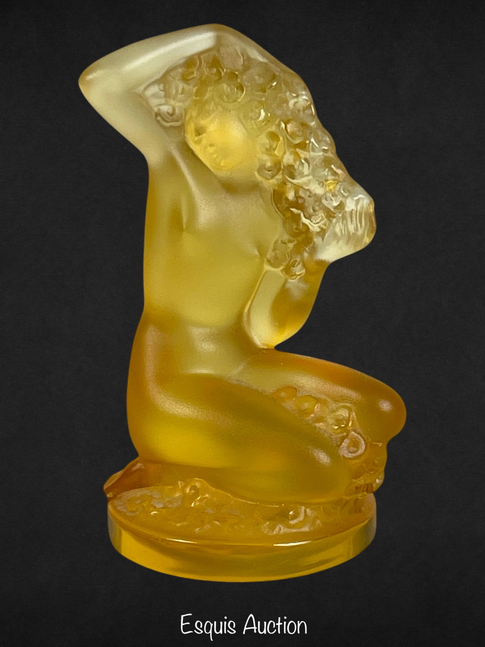 Lalique France Glass Amber Floreal Nude Female: Immerse yourself in the timeless elegance of Lalique France with the exquisite Glass Amber Floreal Nude Female Figurine. Standing at 3 inches tall, this delicate piece captures the grace and beauty of