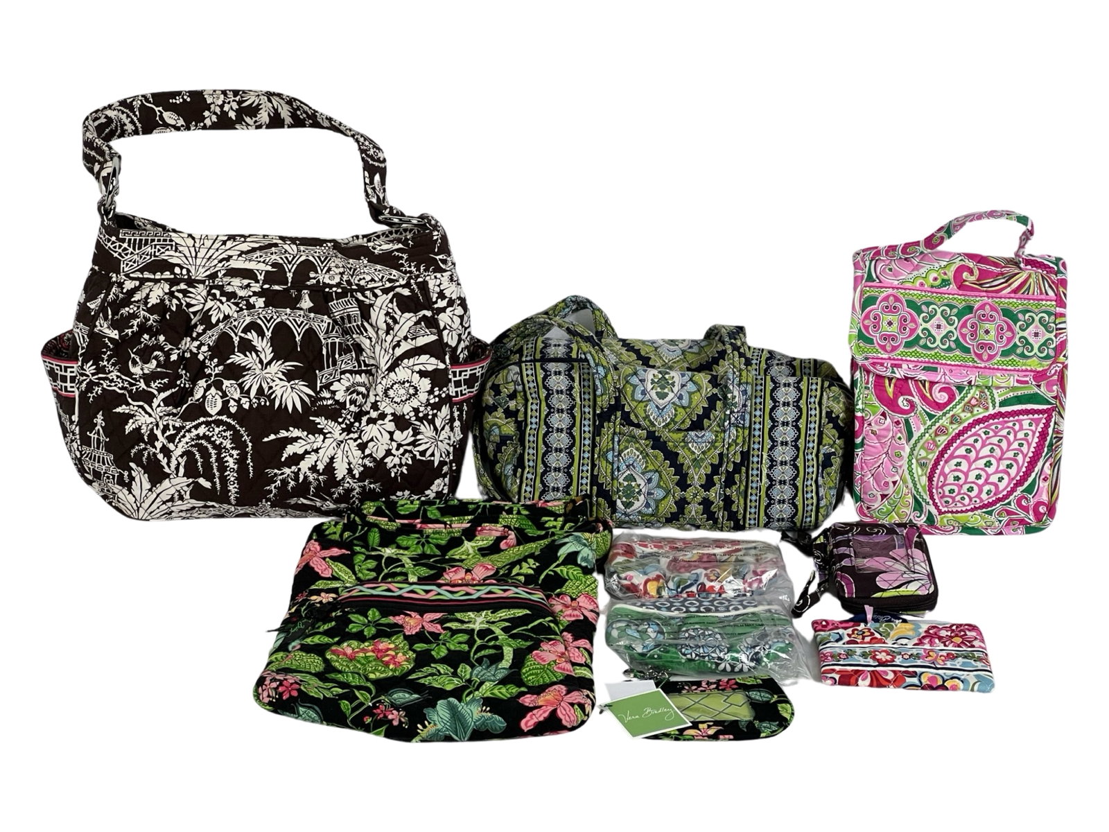 Vera Bradley Designer Handbags and Wallets: Vera Bradley Designer Handbags, Lunch Box and Wallets. Largest is 14" x 13". Some are new with tags, some are slightly pre-loved. Largest is 13" x 11".