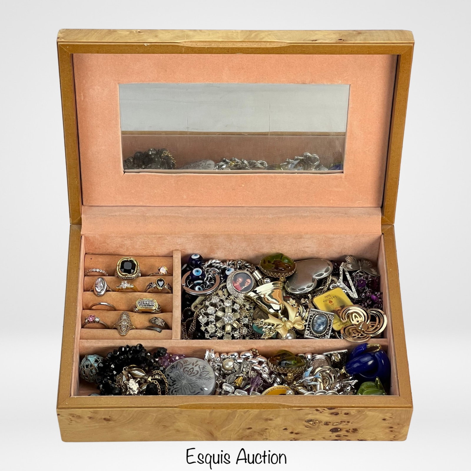 Wooden Jewelry Box filled with Unsearched Jewelry: Uncover the allure of unsearched treasures and let the wooden jewelry box become a vessel of surprises, offering a delightful journey into the world of accessories.Unsearched, some might be as found.