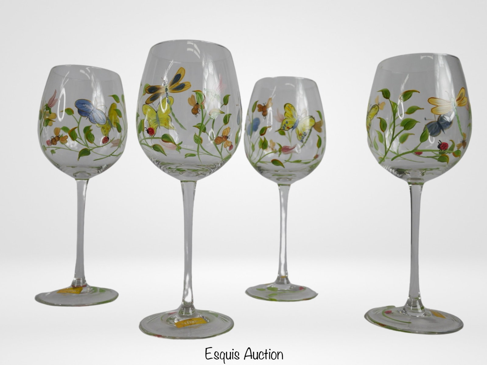 Lenox Butterfly Meadow Handpainted Wine Glasses: Elevate your dining experience with the exquisite beauty of the Lenox Butterfly Meadow Handpainted Wine Glasses. This set of 4 glasses, each standing tall at 9 1/2", is a delightful addition to any ta