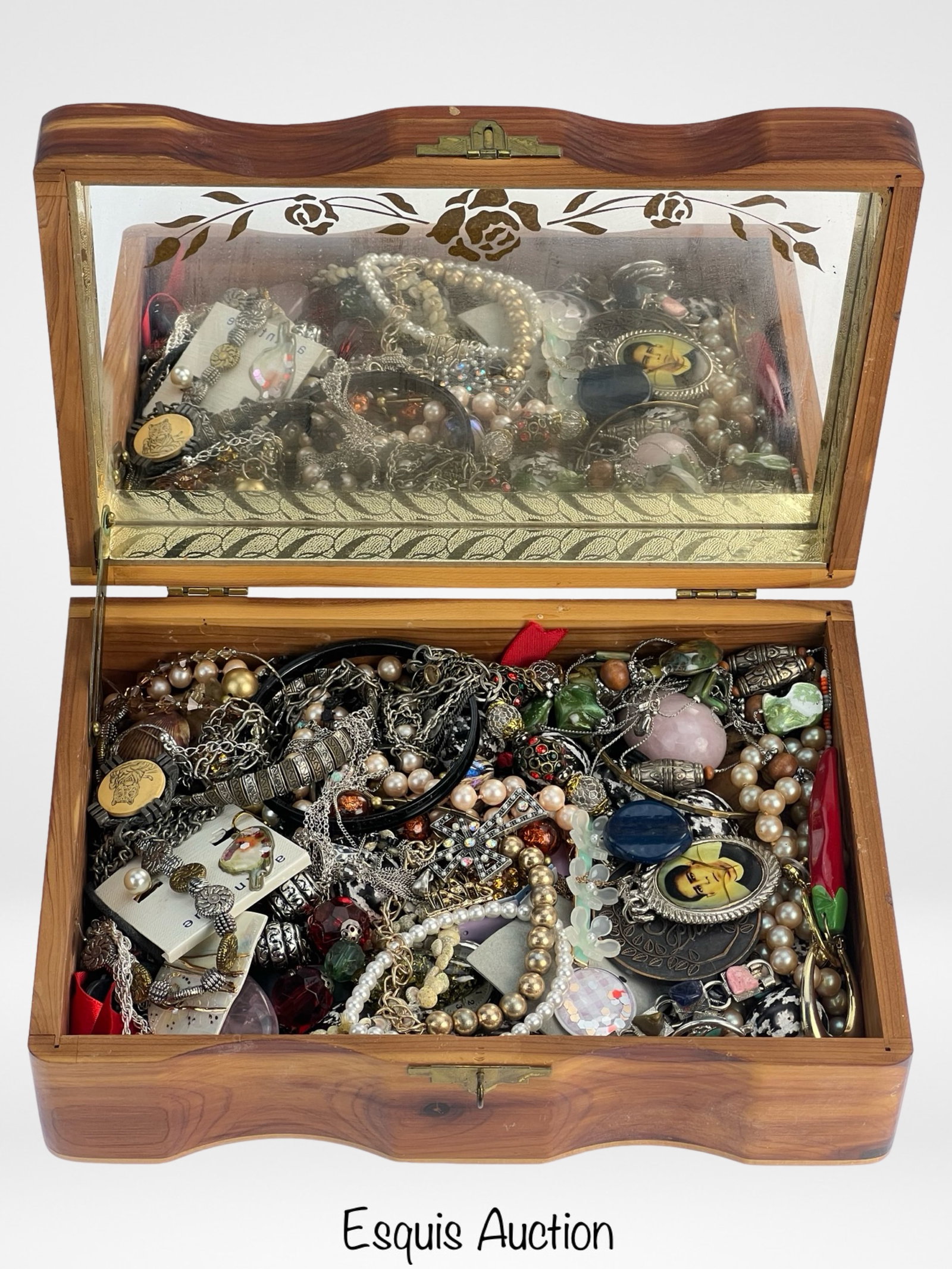 Vintage Jewelry Box full of Jewelry: Embark on a delightful journey through time and style with this vintage jewelry box filled to the brim with unsearched treasures. Each piece holds the promise of discovery, offering a glimpse into the