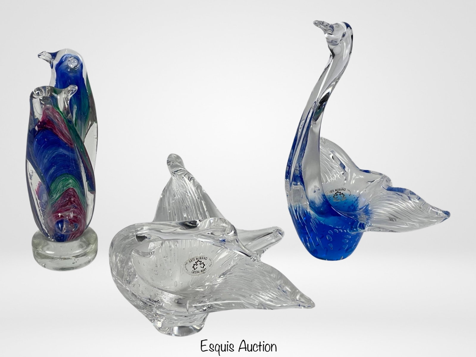 Murano Venetian Glass Bird Sculptures: Immerse yourself in the timeless elegance of Venetian glass art with this exquisite lot of 3 Murano bird figurines, featuring penguins and swans.Crafted on the storied island of Murano, renowned for i