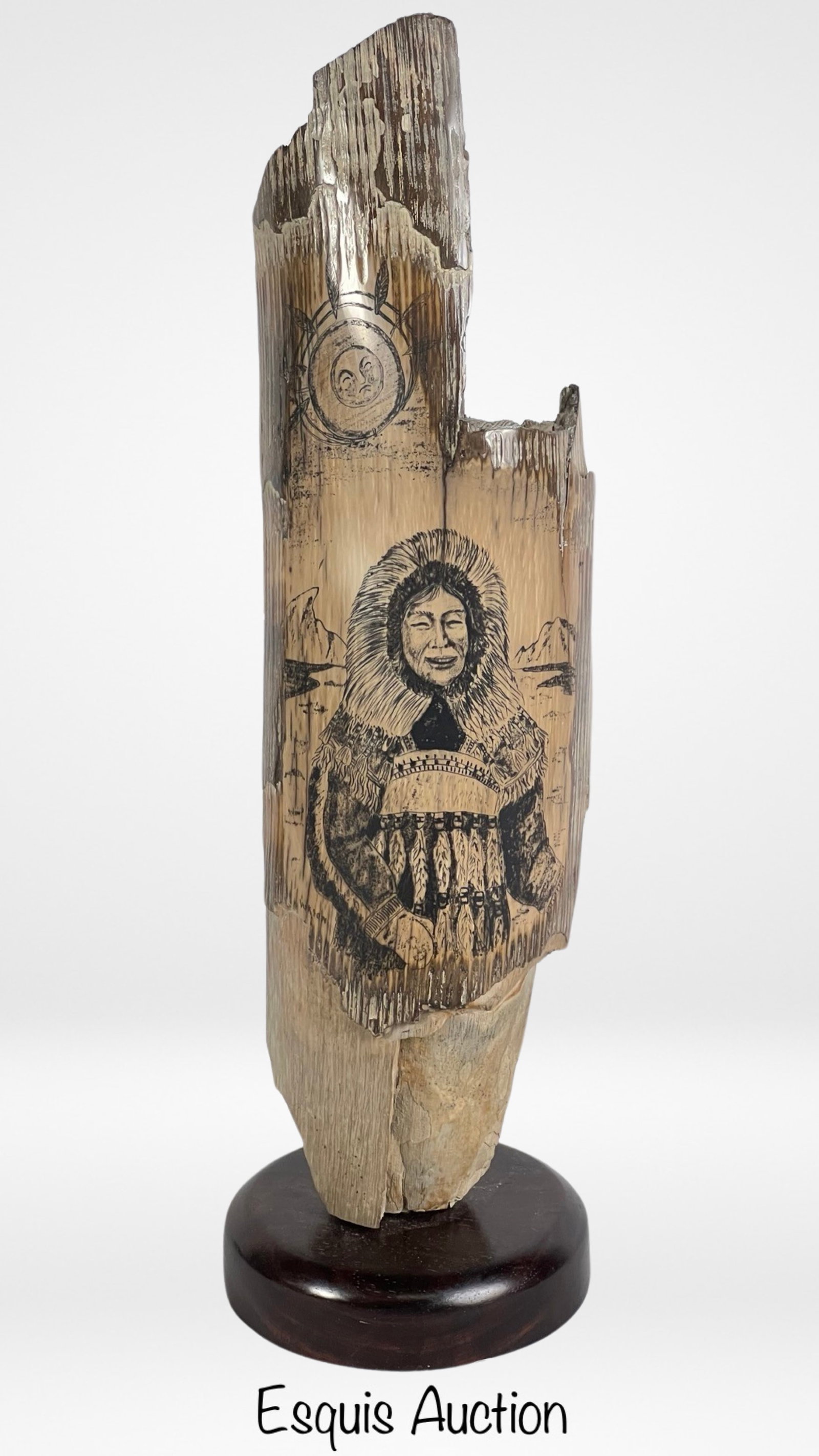 Inuit Driftwood Art Sculpture with Fisherman: Immerse yourself in the rich cultural heritage of the Inuit people with this captivating Inuit Driftwood Art Sculpture featuring an image of an Inuit fisherman. Standing tall at 17", this unique piece