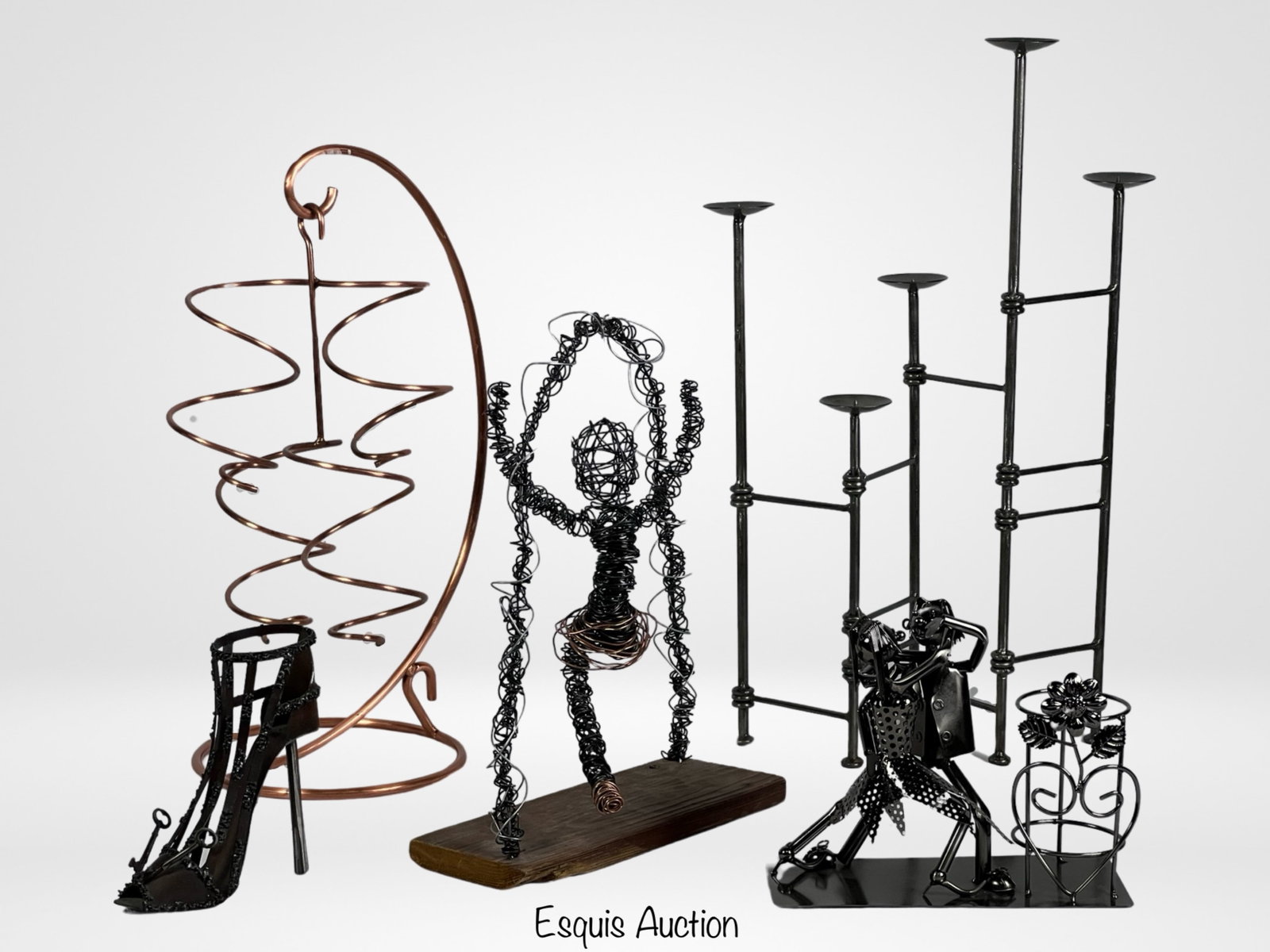 Unique Wine Holder and Decor Collection: Elevate your home decor and wine presentation with this eclectic collection featuring a variety of distinctive pieces.Oenophilia Copper Table Tendril 4-Bottle Wine Rack: Elegant copper rack holds four