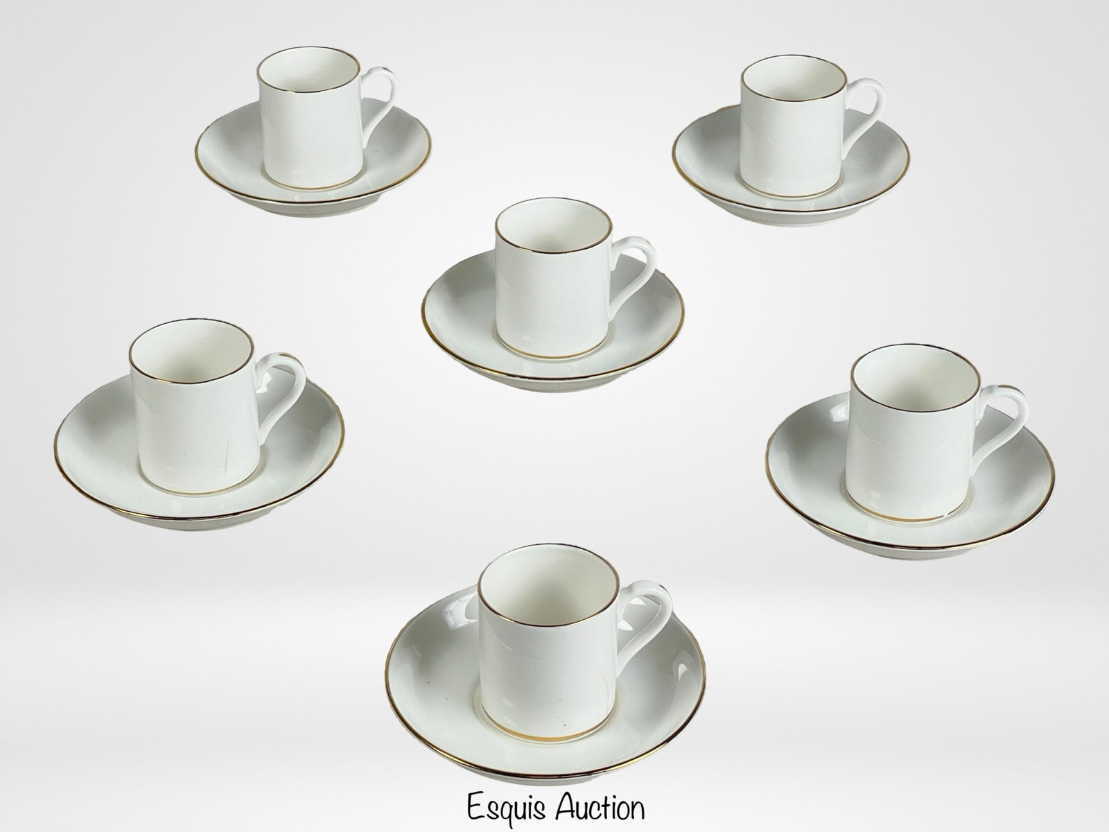 Tiffany & Co Crown Staffordshire Tea Cup Set: Indulge in refined elegance with this exquisite Tiffany & Co Crown Staffordshire Fine Bone China Demitasse Tea Cup Set for 6, a testament to timeless luxury and impeccable craftsmanship.Included in th