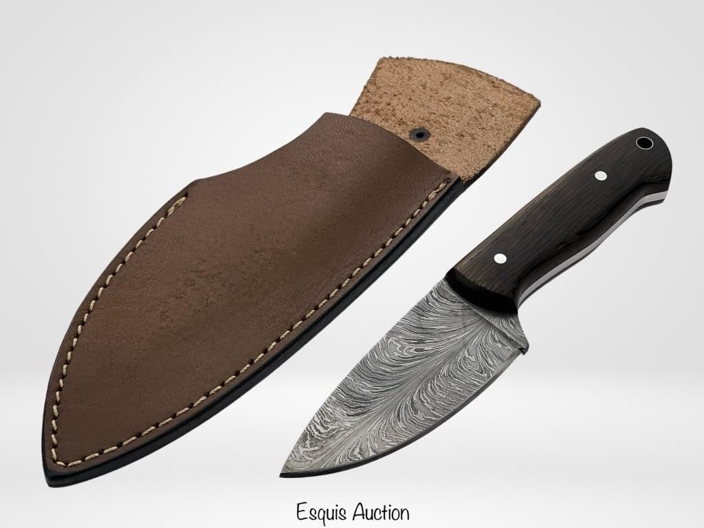Damascus Steel Feather Knife by artist Hunan Mugal: Presenting a masterpiece of craftsmanship and artistry, the Damascus Steel Feather Knife, meticulously handcrafted by the renowned artist Hunan Mugal. This exquisite knife stands as a testament to the
