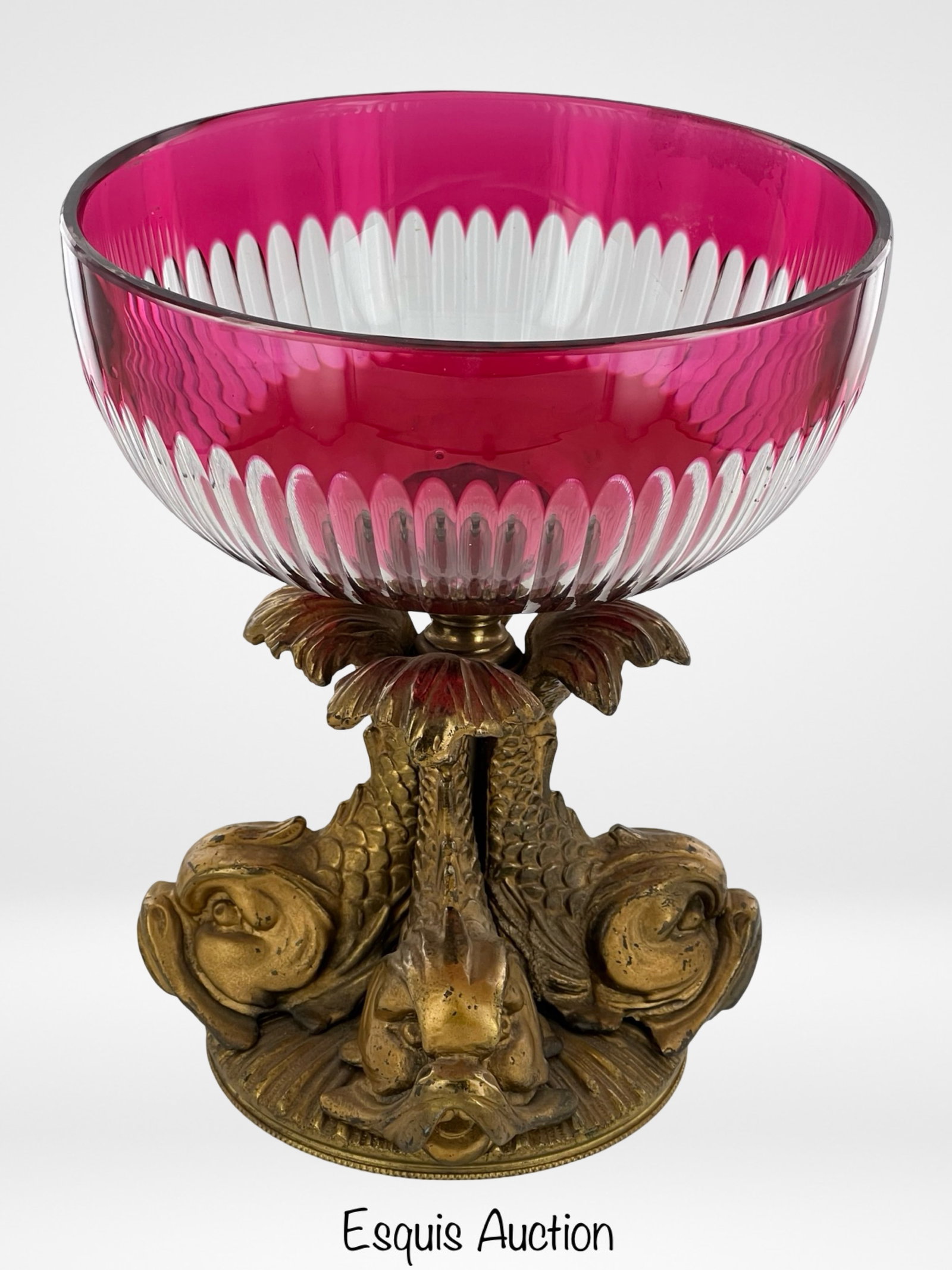 Bohemian Cut Cranberry Glass Coupe Koi Fish Pedest: Immerse yourself in the opulence of the early 20th century with this stunning Bohemian Cut Cranberry Glass Coupe, elegantly elevated by an ormolu gilt metal Koi fish pedestal. Standing at an impressiv