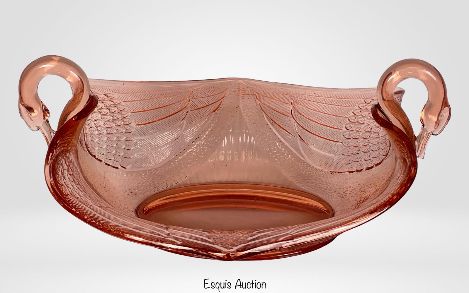 Fenton Pink Depression Glass Swan Handled Bowl: Add a touch of vintage charm to your collection with this delightful Fenton Pink Depression Glass Swan Handled Bowl, measuring 12" x 10 1/2" x 5 1/2". Crafted by Fenton, a renowned American glass manu