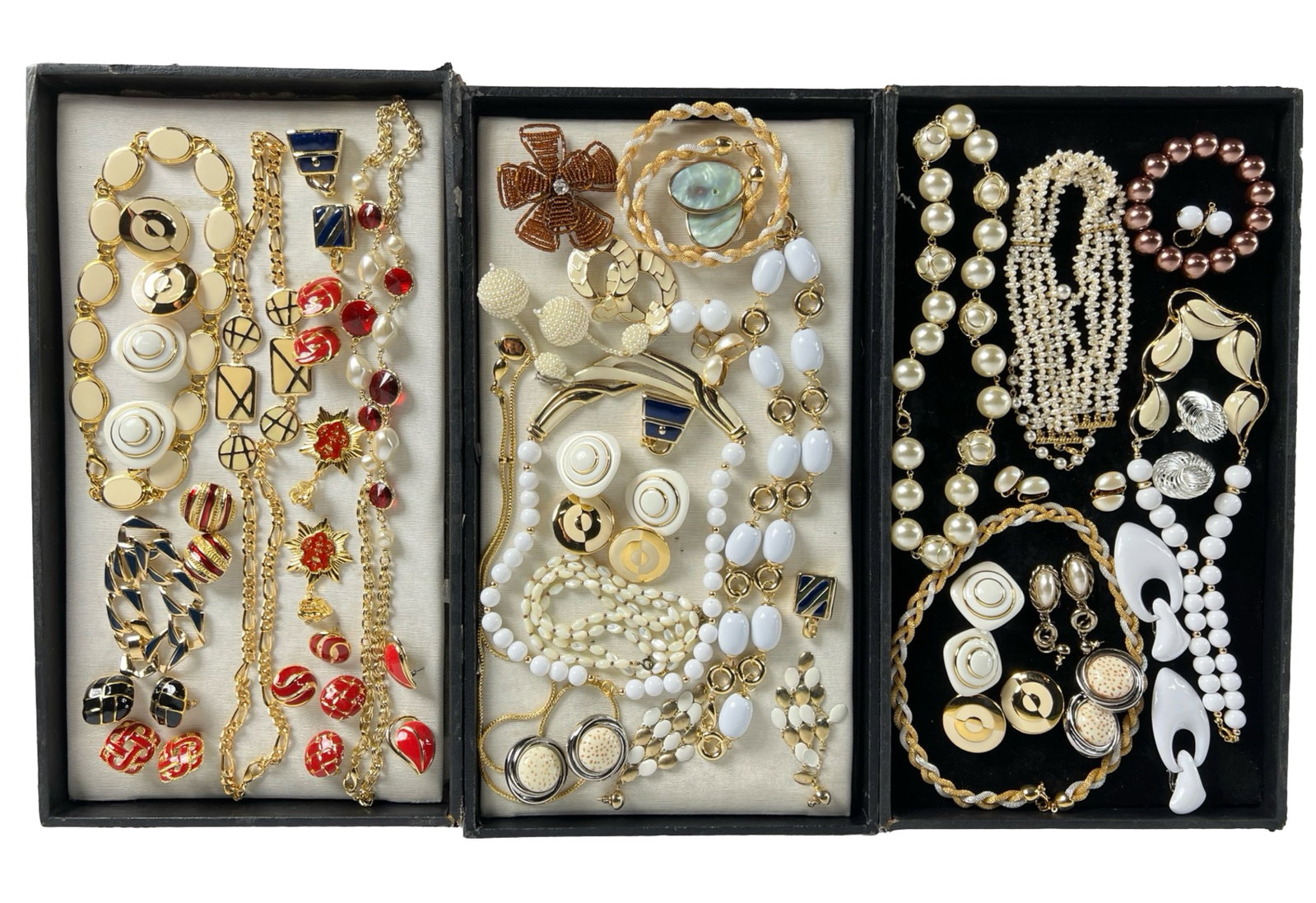 Assortment of Costume Jewelry: Elevate your style with this dazzling Assortment of Costume Jewelry. Bursting with variety, this collection features an array of necklaces, earrings, bracelets, and more, each piece designed to add a 