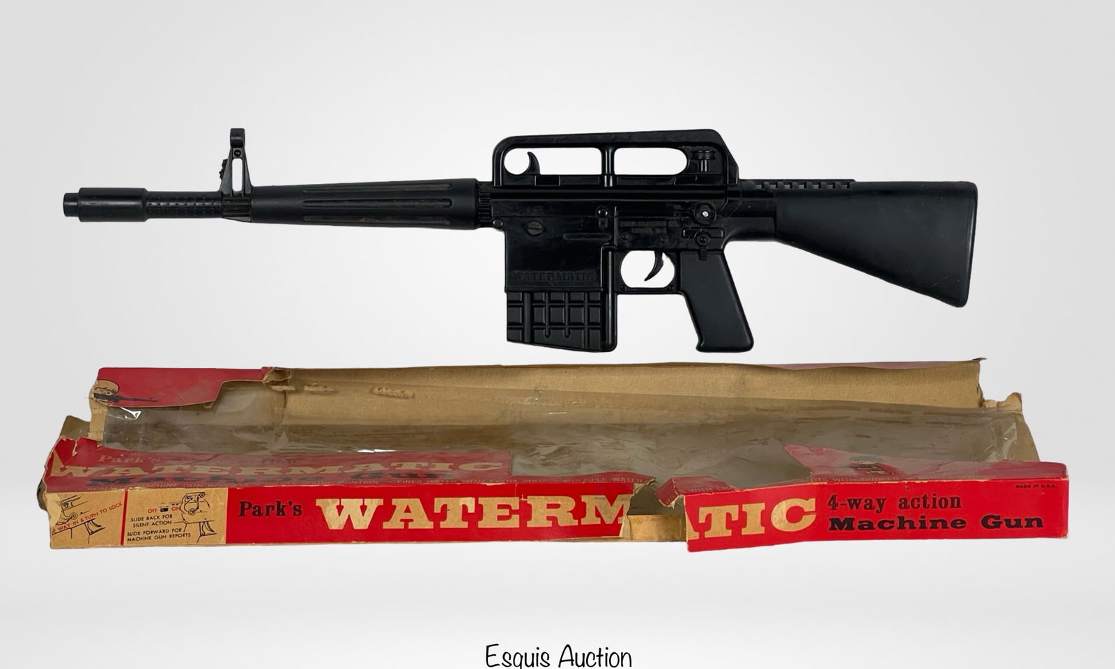 Vintage Park's Watermatic M16/AR15 Machine Gun: Vintage Park's Watermatic M16/AR15 Machine Gun from 1960's. in original box. Good overall condition, box shows storage wear.