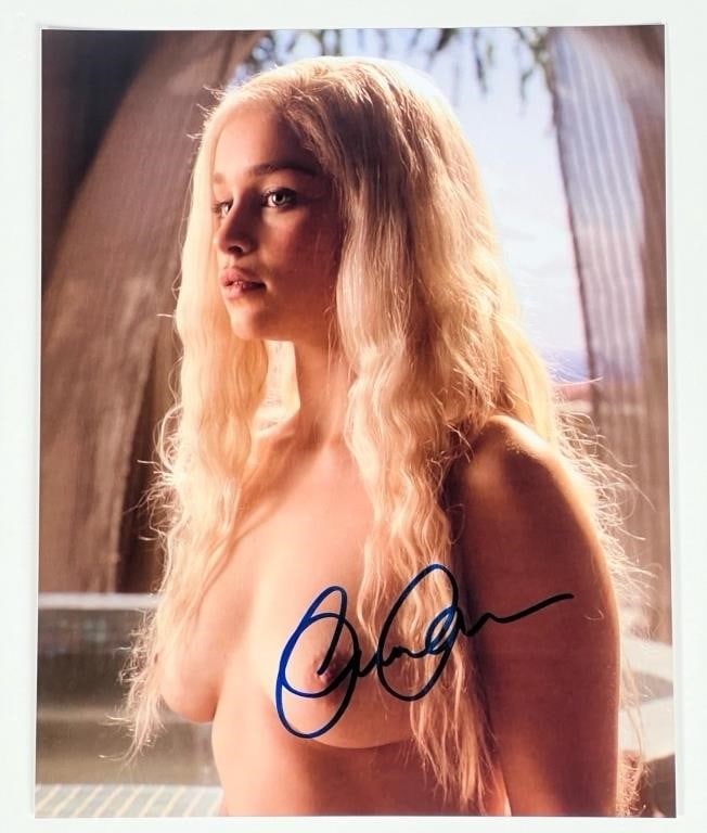 Emilia Clarke "Game of Thrones" Signed Photograph: Step into the fantastical realm of Westeros with this autographed photograph of Emilia Clarke from "Game of Thrones." Measuring 8" x 10", this captivating piece captures the iconic actress in her role