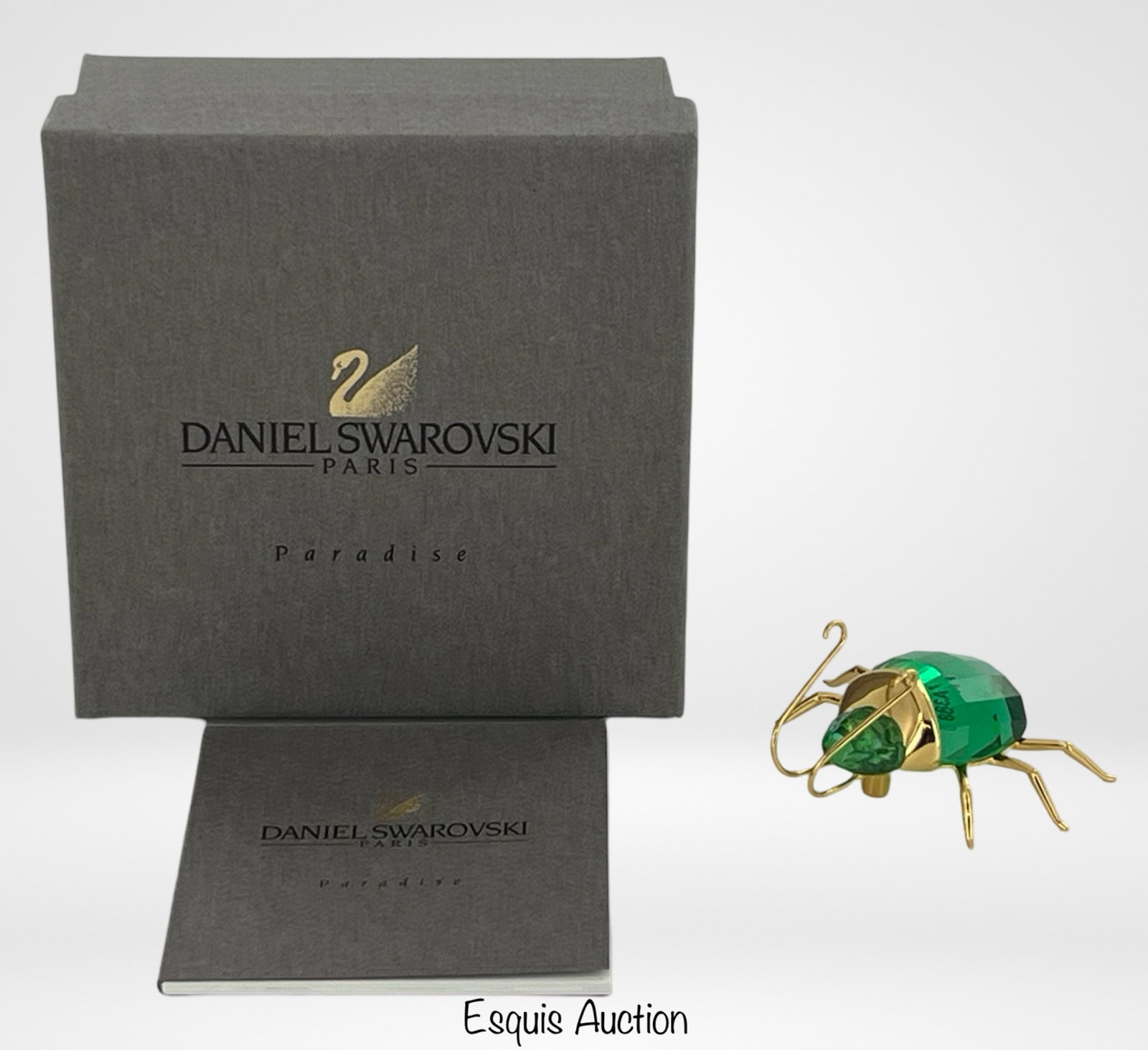 Swarovski Green Crystal Paradise Bug Brooch: This stunning Swarovski Green Crystal Paradise Bug Brooch is a masterpiece of design and craftsmanship. The brooch features a beautifully detailed bug, encrusted with vibrant green crystals that catch