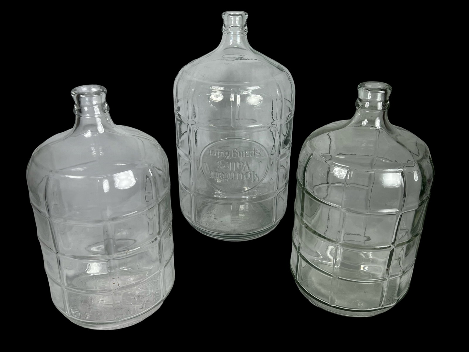 Lot of 3 5 Gallon Glass Carboy Bottles: Lot of 3 5 Gallon Glass Carboy Bottles- two are made in Italy and one is "Mountain Valley Spring Water".