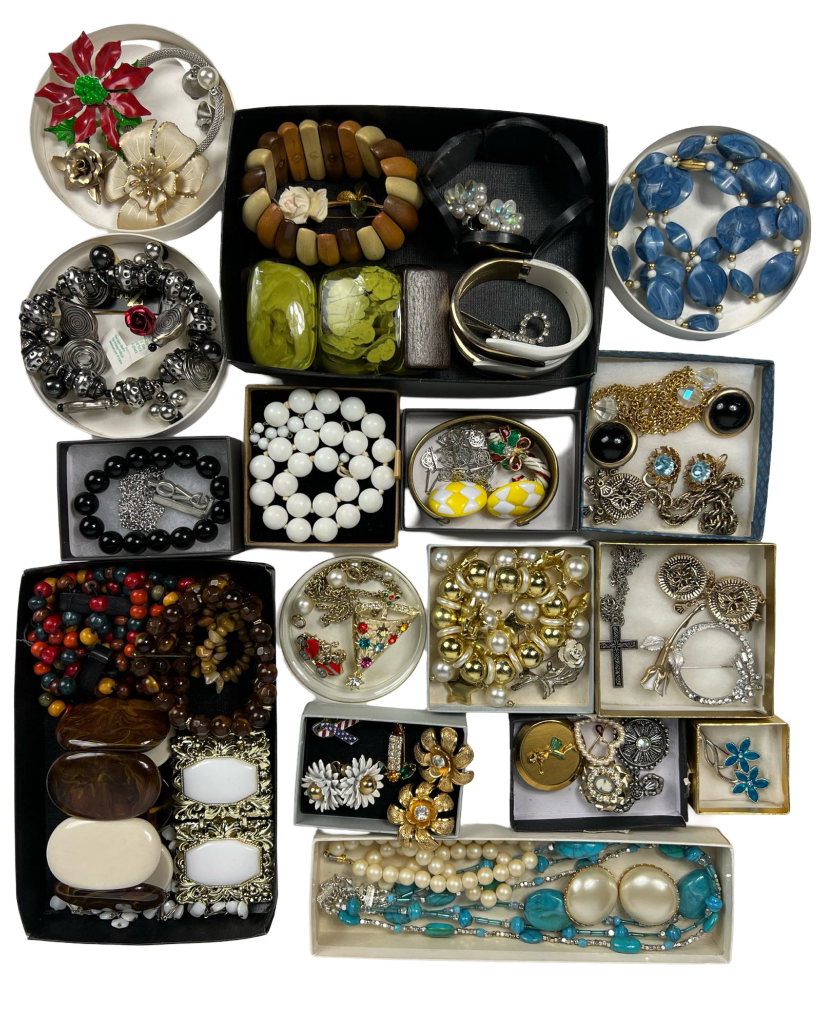 Assortment of Costume Jewelry: Elevate your style with this dazzling Assortment of Costume Jewelry. Bursting with variety, this collection features an array of necklaces, earrings, bracelets, and more, each piece designed to add a 