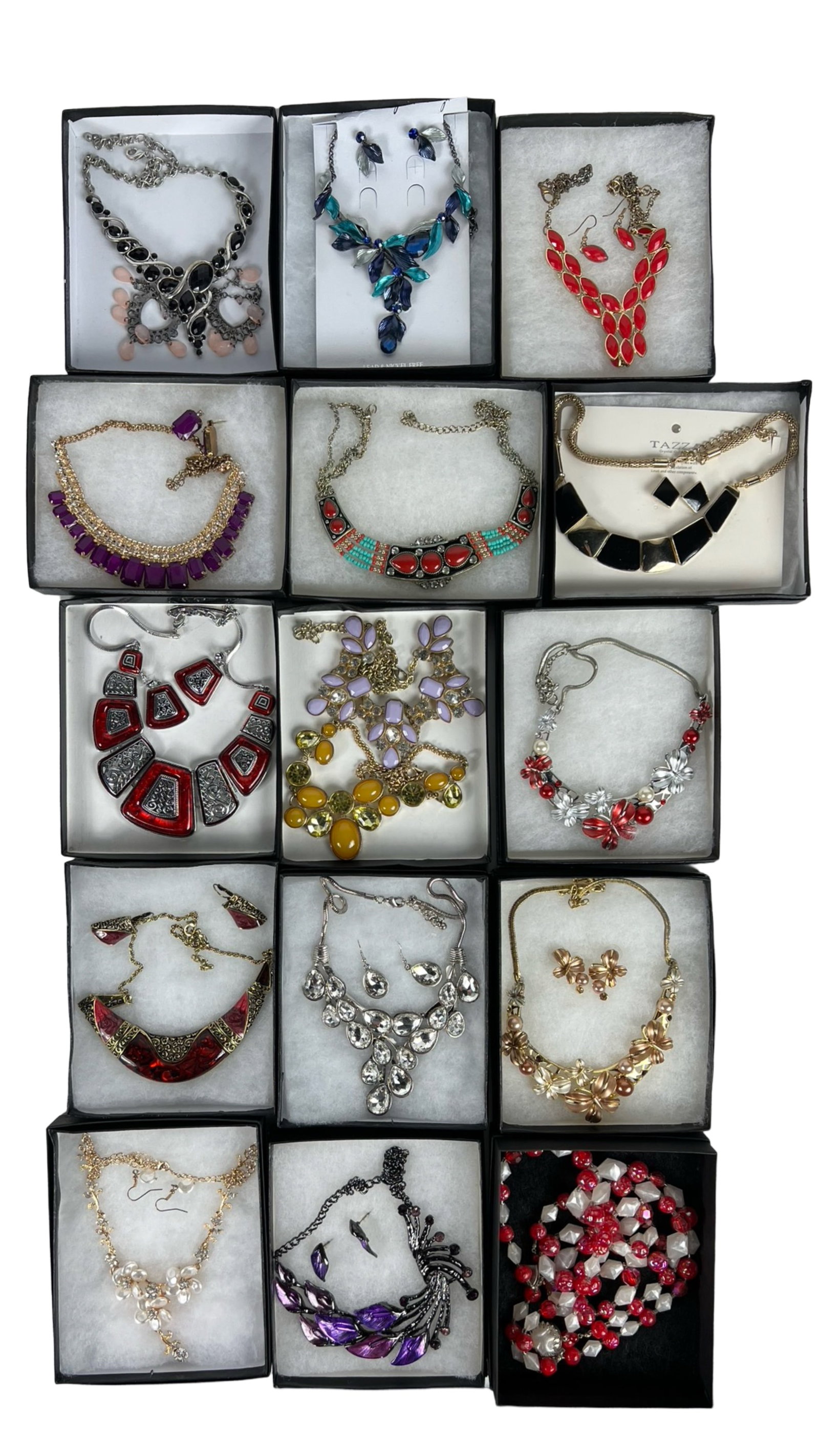 Assortment of Costume Jewelry: Elevate your style with this dazzling Assortment of Costume Jewelry. Bursting with variety, this collection features an array of necklaces, earrings, bracelets, and more, each piece designed to add a 