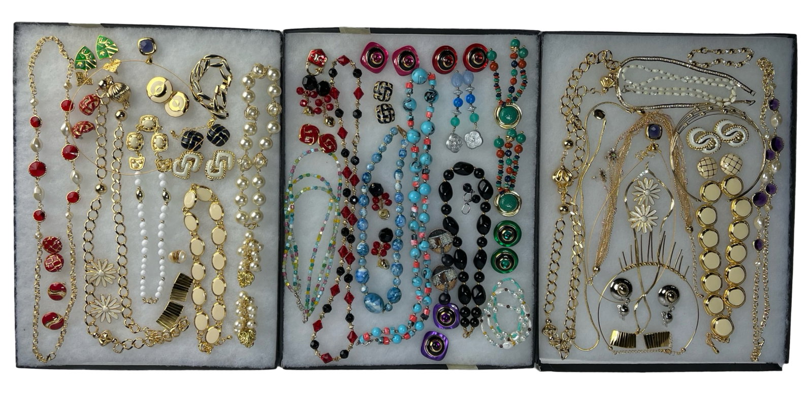 Assortment of Costume Jewelry - Sparkling Variety: Elevate your style with this dazzling Assortment of Costume Jewelry. Bursting with variety, this collection features an array of necklaces, earrings, bracelets, and more, each piece designed to add a 