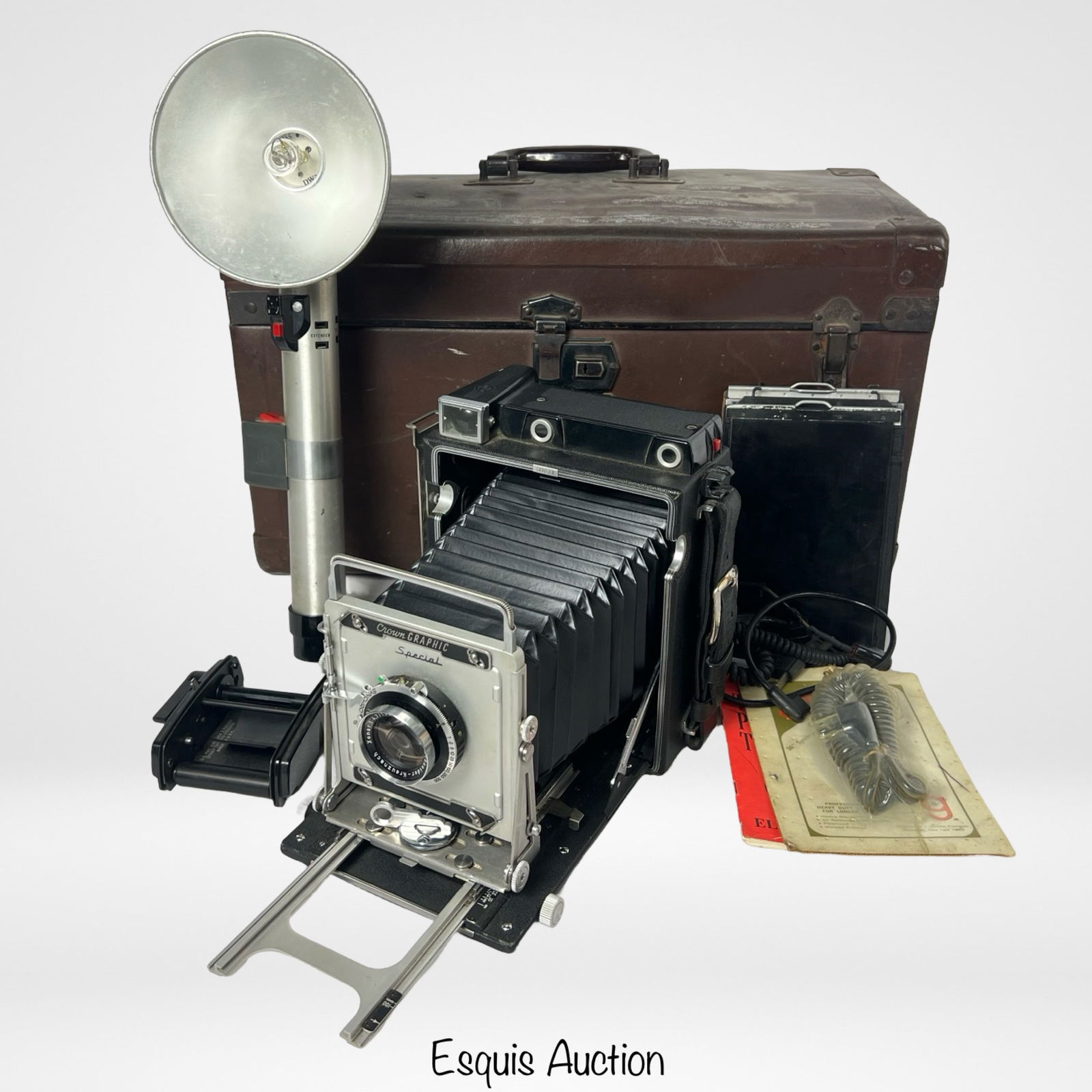 Graflex Crown Graphic Special 135/4.7 Camera: Vintage Graflex Crown Graphic Special Camera with Xenaar 135/4.7 Lens. Comes in Case with Accessories. Good overall condition, normal age related wear. shutter seems to be working.