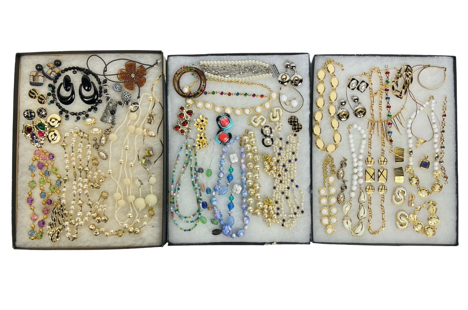Assortment of Costume Jewelry: Elevate your style with this dazzling Assortment of Costume Jewelry. Bursting with variety, this collection features an array of necklaces, earrings, bracelets, and more, each piece designed to add a 