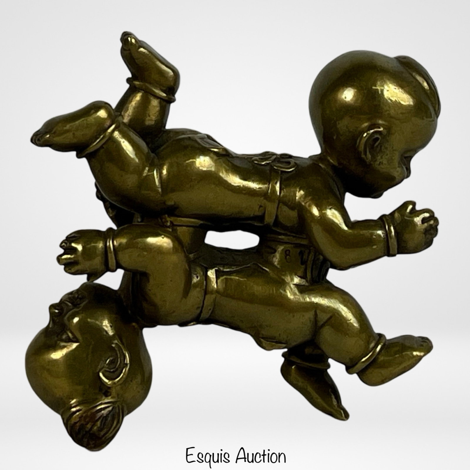 Chinese Bronze Hehe Erxian Twins Sculpture/ Paperw: A finely crafted Chinese bronze Hehe Erxian twins sculpture, also suitable as a paperweight. The piece beautifully captures the playful and harmonious nature of the Hehe Erxian, the twin Taoist immort