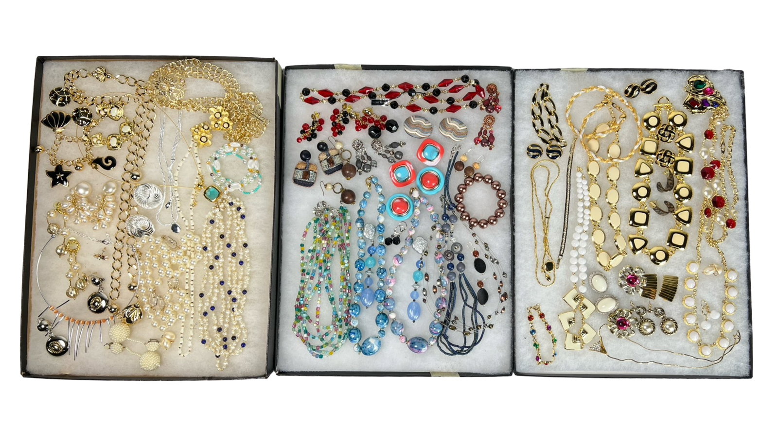 Assortment of Costume Jewelry: Elevate your style with this dazzling Assortment of Costume Jewelry. Bursting with variety, this collection features an array of necklaces, earrings, bracelets, and more, each piece designed to add a 