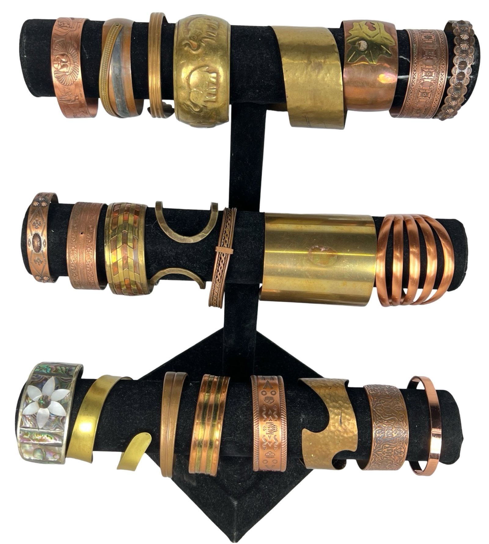 Copper & Brass Lady's Bracelets: Explore a diverse assortment of mostly copper or brass bracelets, each one offering its own unique style and charm.